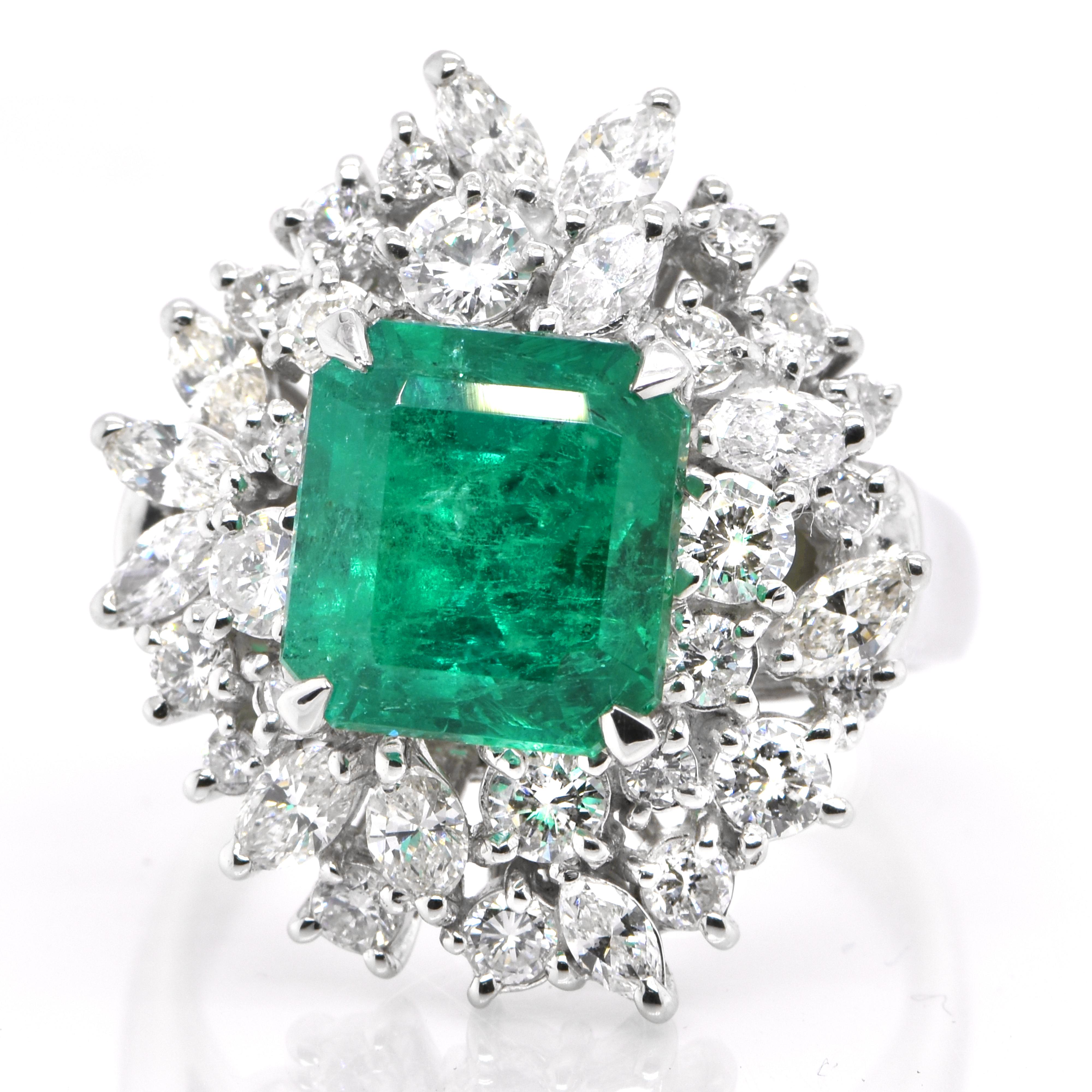A stunning ring featuring a 4.61 Carat Natural Colombian Emerald and 2.10 Carats of Diamond Accents set in Platinum. People have admired emerald’s green for thousands of years. Emeralds have always been associated with the lushest landscapes and the