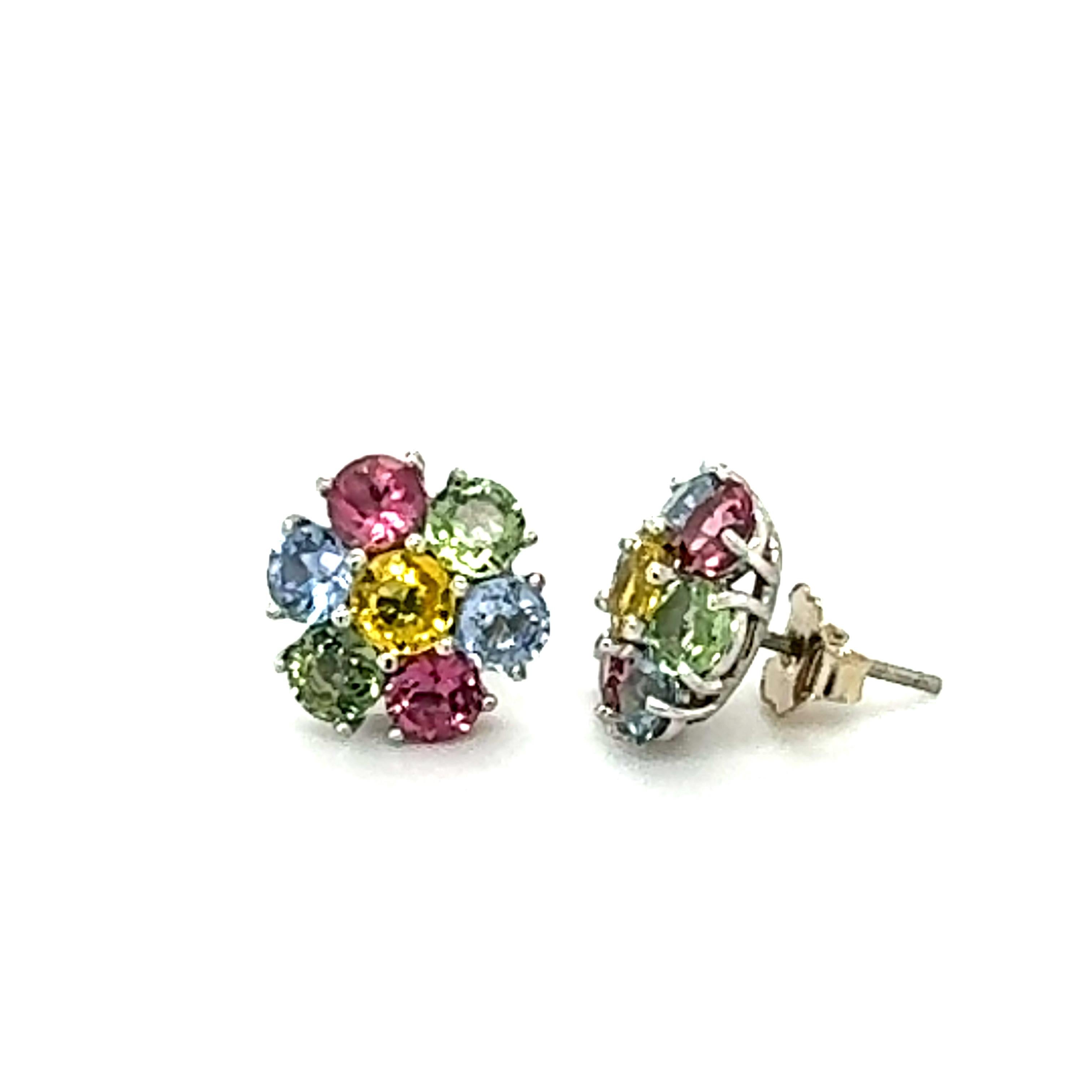 4.61 Carat Natural Sapphire Tourmaline White Gold Stud Earrings

Cute, dainty earrings that are versatile and great for an everyday look!  

There are 10 Multi-Colored Sapphires and 4 Pink Tourmaline set to create a Flower Petal Design.  The total