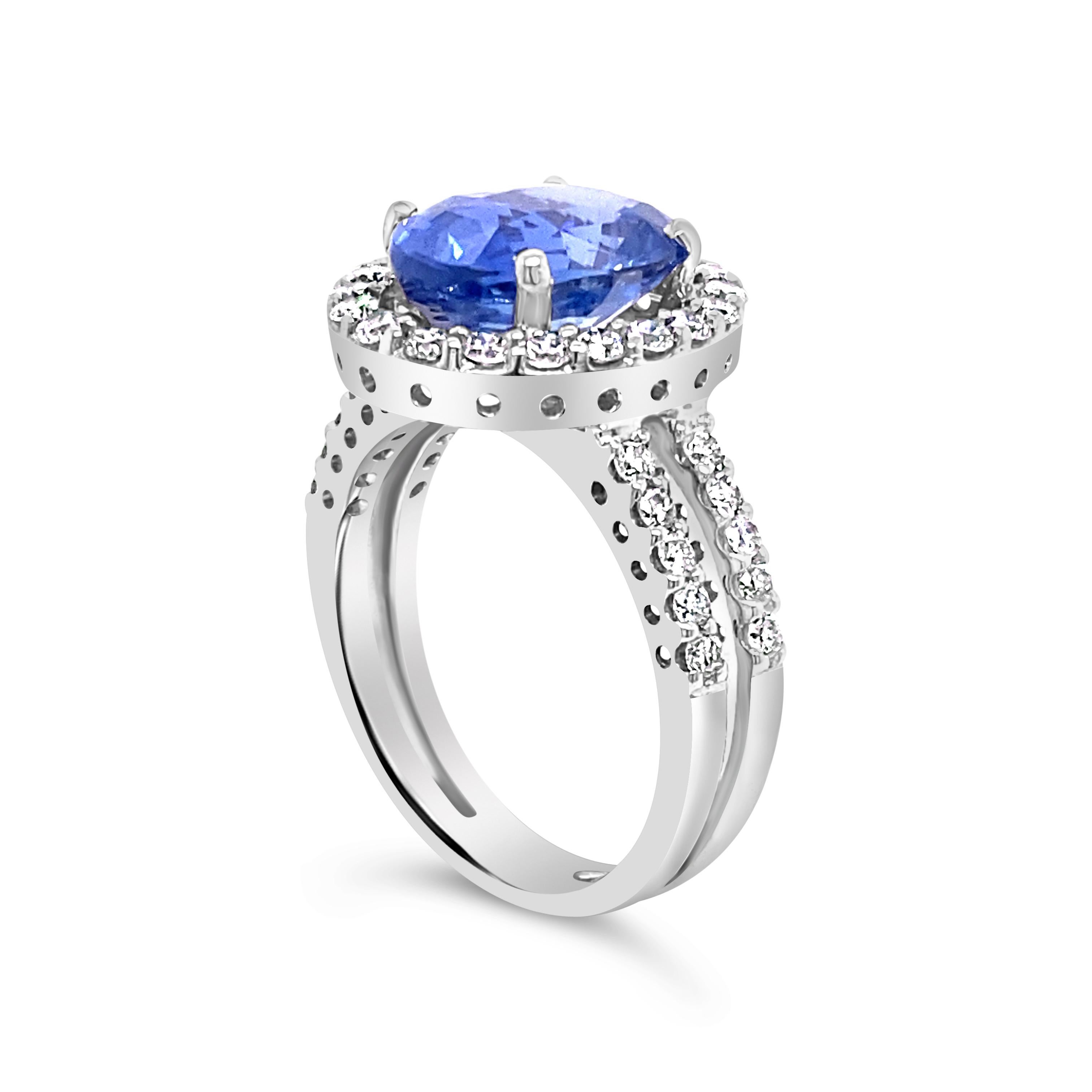 Oval Cut GIA 4.61 Carat Oval Burma Sapphire Ring with 0.73ctw Diamond Halo Cocktail Ring For Sale