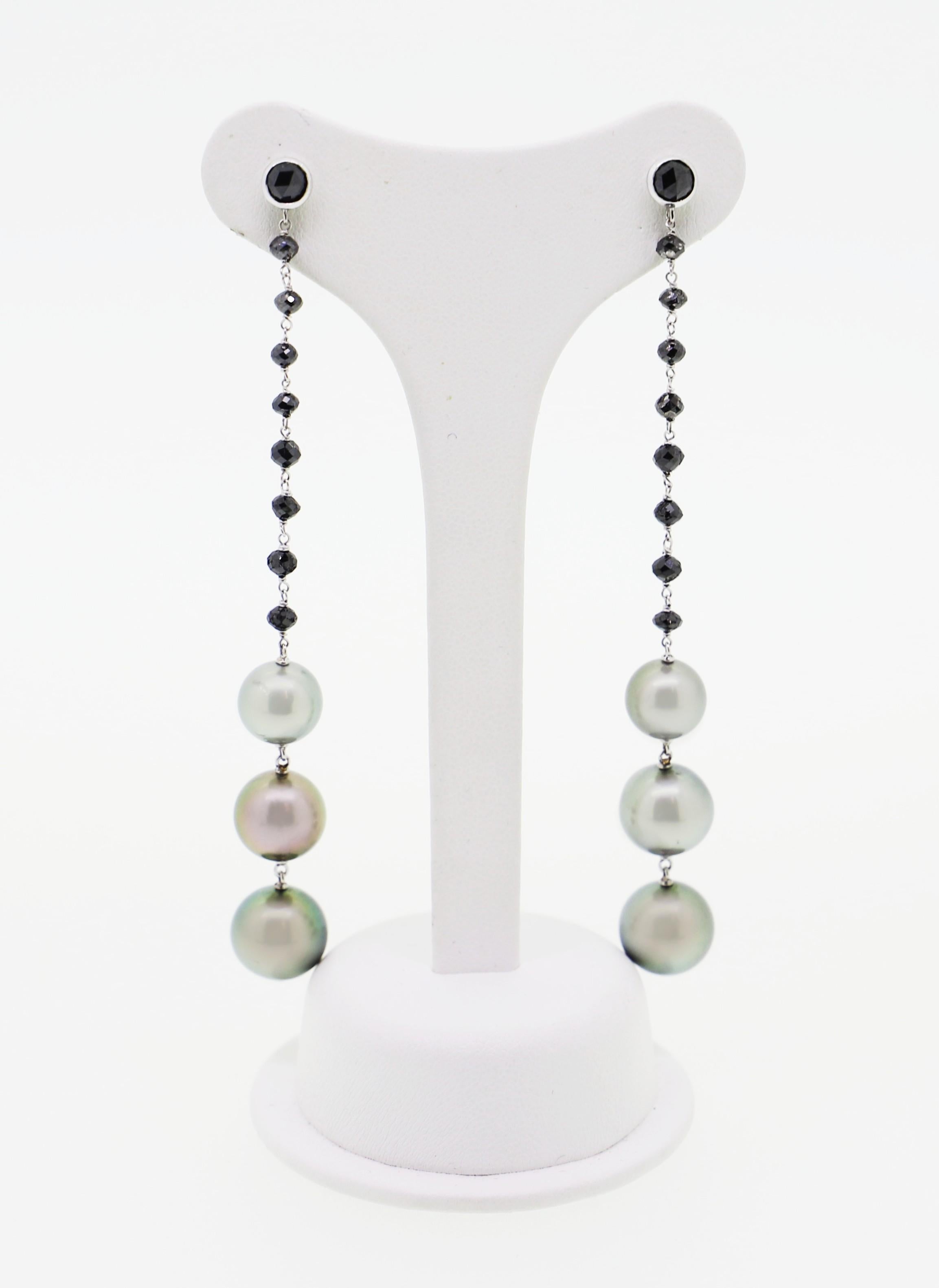 Contemporary 46.10 Carat Tahity Pearls with Black Diamond Beads Dangle Earrings For Sale