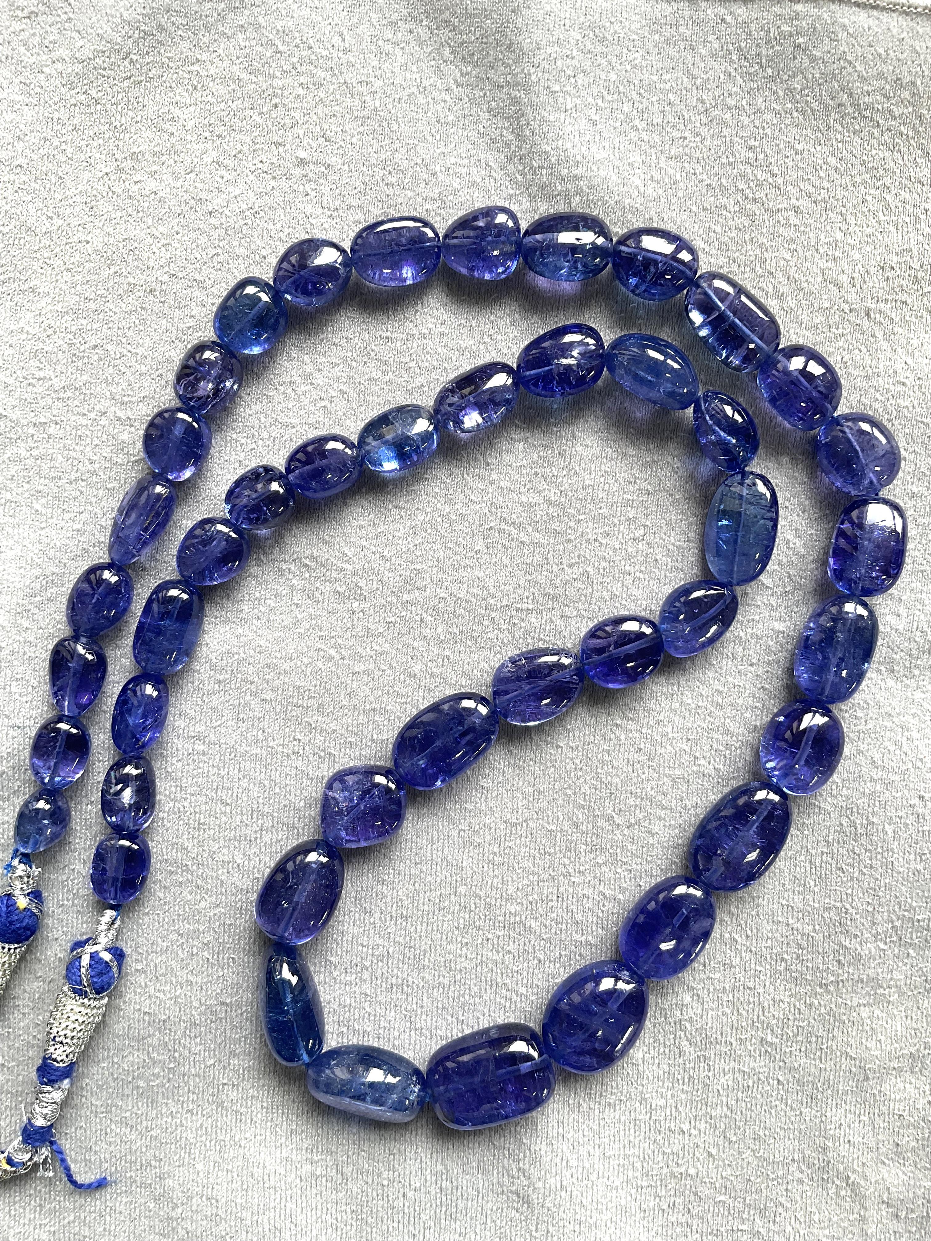 461.15 Carats Tanzanite Top Quality Plain Tumble For Fine Jewelry Natural Gem 
Weight - 461.15 Ct 
Size  - 8x10 To 14x11 MM
Quantity - 1  Strand
