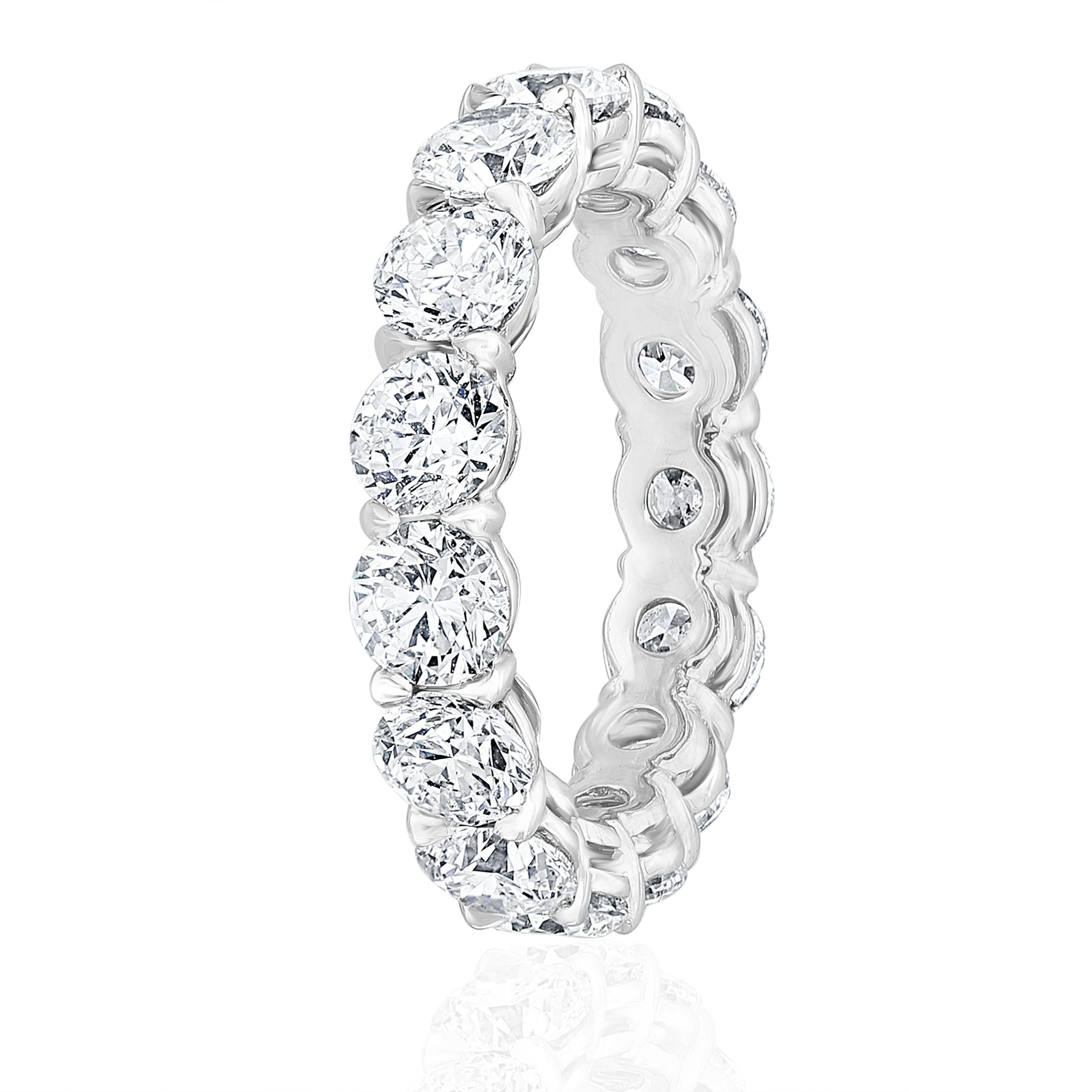 This beautiful Eternity Ring is set with 15 perfectly matched Round Brilliant Cut Diamonds, each weighing between 0.30ct to 0.31ct totaling 4.62 Carats. Made in New York City using Platinum 950. Fits US Size 6.

Diamonds are of G-H color and SI