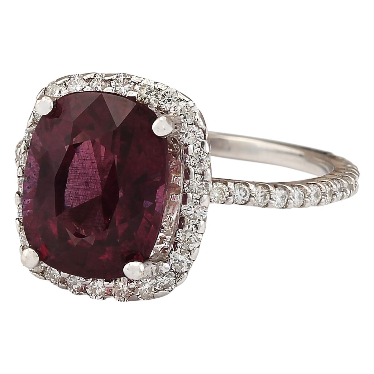 Stamped: 14K White Gold
Total Ring Weight: 3.4 Grams
Total Natural Garnet Weight is 3.92 Carat (Measures: 10.00x8.00 mm)
Color: Red
Total Natural Diamond Weight is 0.70 Carat
Color: F-G, Clarity: VS2-SI1
Face Measures: 12.80x11.40 mm
Sku: [703897W]