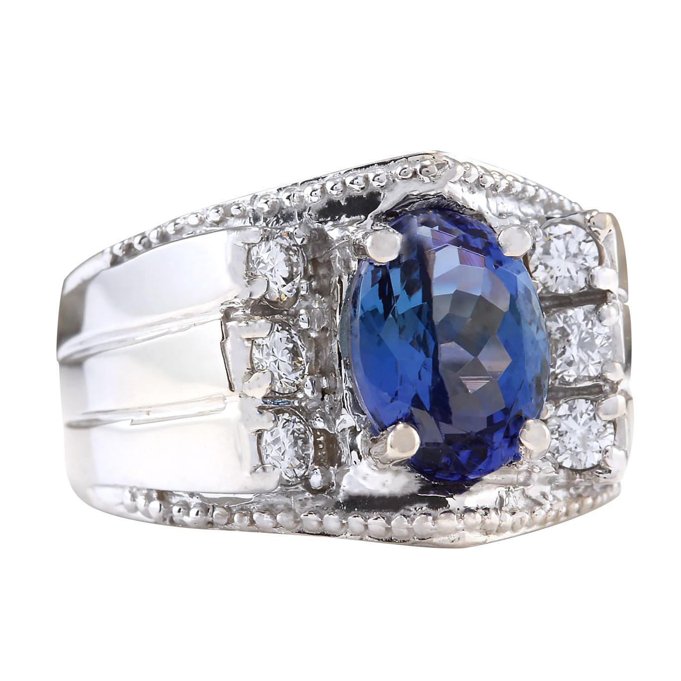 Stamped: 14K White Gold
Total Ring Weight: 14.0 Grams
Total Natural Tanzanite Weight is 4.02 Carat (Measures: 10.00x8.00 mm)
Color: Blue
Total Natural Diamond Weight is 0.60 Carat
Color: F-G, Clarity: VS2-SI1
Face Measures: 15.40x17.40 mm
Sku: