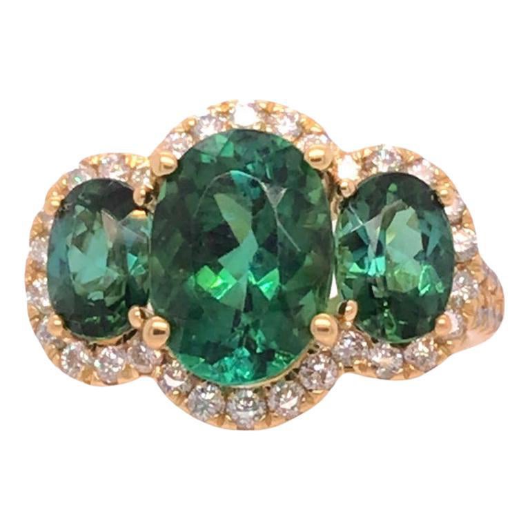4.62 Carat Oval Cut Green Tourmaline 3-Stone Ring with Dia Halo in 18Y ref1612