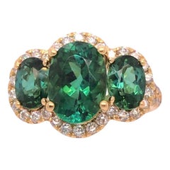 4.62 Carat Oval Cut Green Tourmaline 3-Stone Ring with Dia Halo in 18Y ref1612