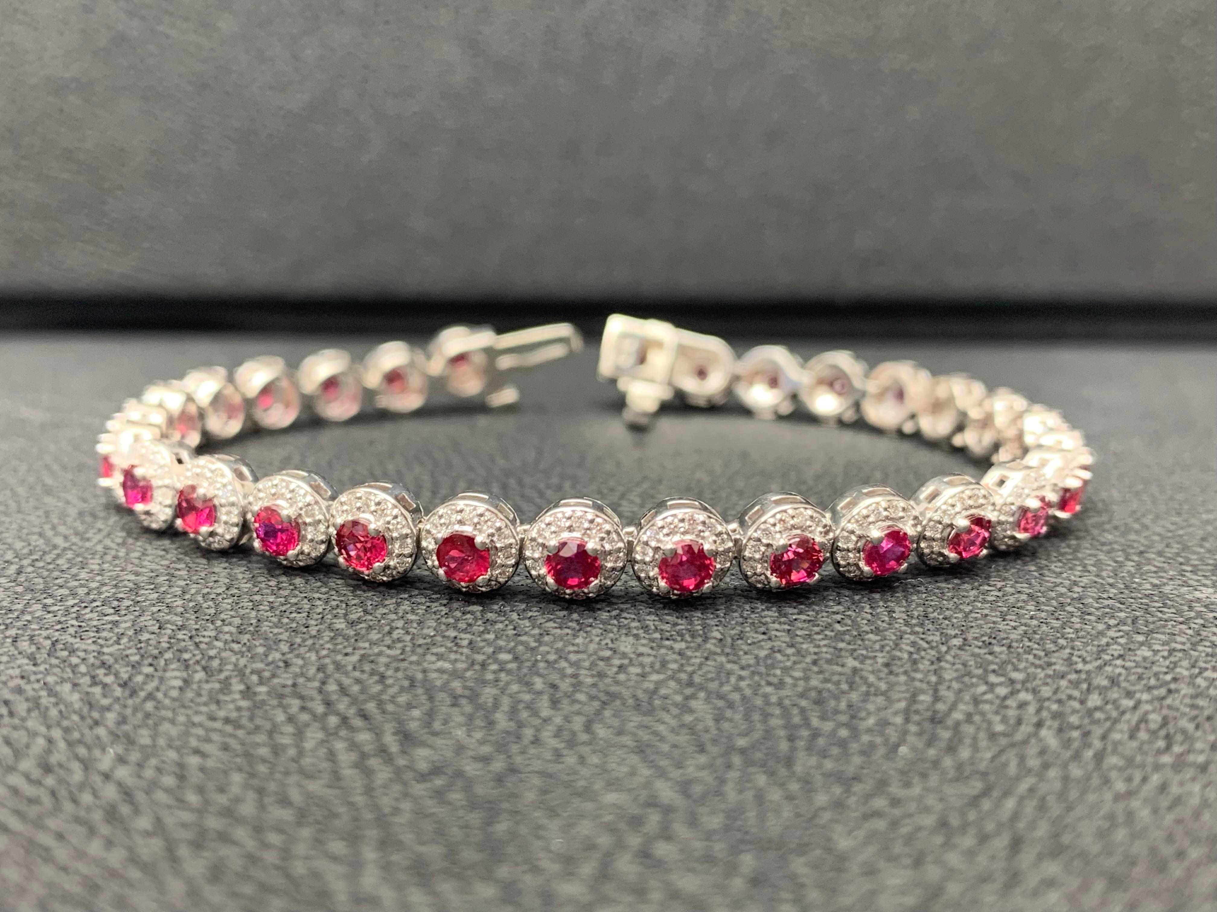 Add color to your style with this gorgeous Ruby bracelet. Features 29 Round cut Red Rubies surrounded by a single row of sparkling round diamonds in a halo setting. Rubies and diamonds weigh 4.62 carats and 1.57 carats total respectively. Made in 14