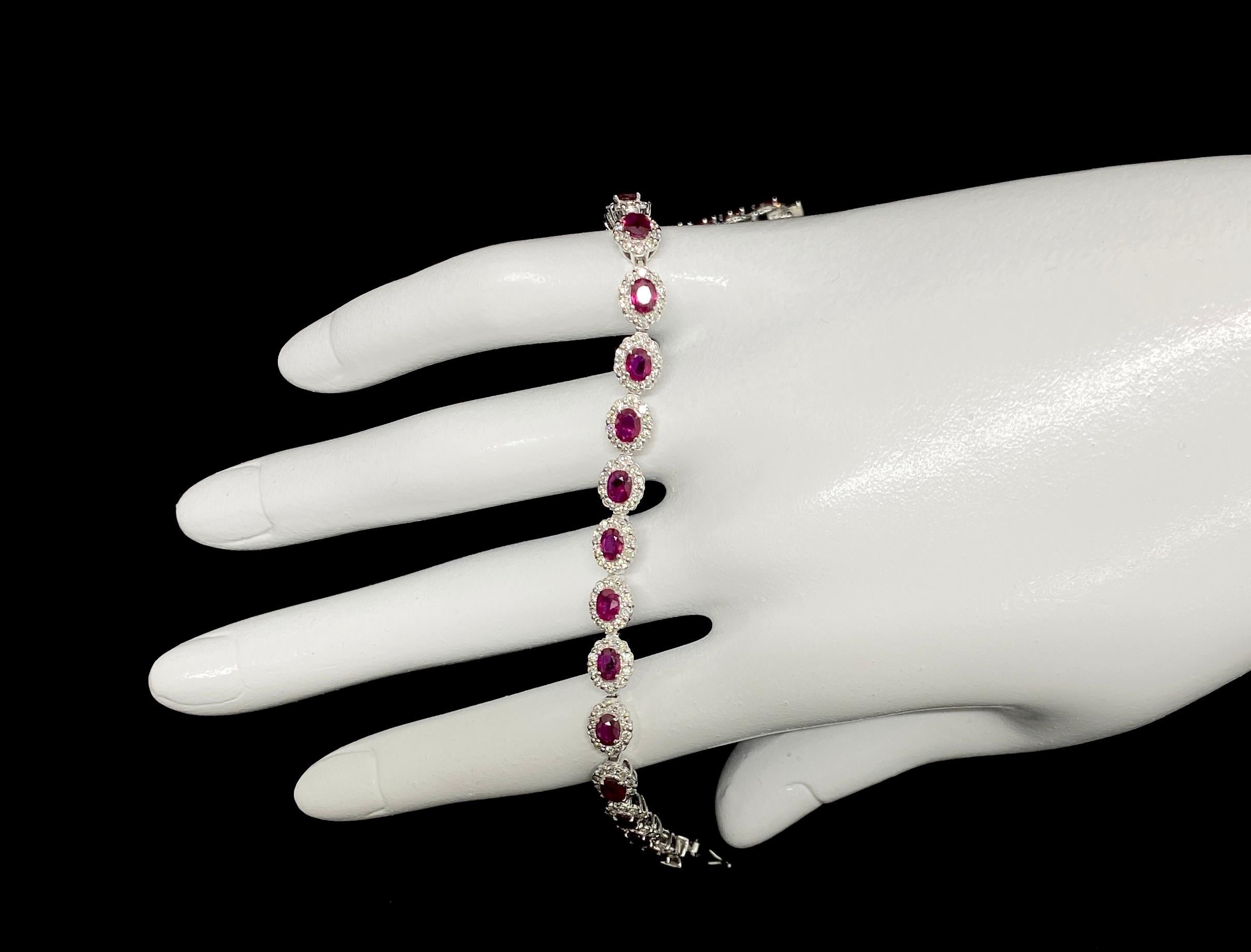 A beautiful Tennis Bracelet featuring a total of 4.62 Carats of Natural Rubies and 1.74 Carats of Diamond Accents set in Platinum. The Rubies are of 4x3mm size. Rubies are referred to as 