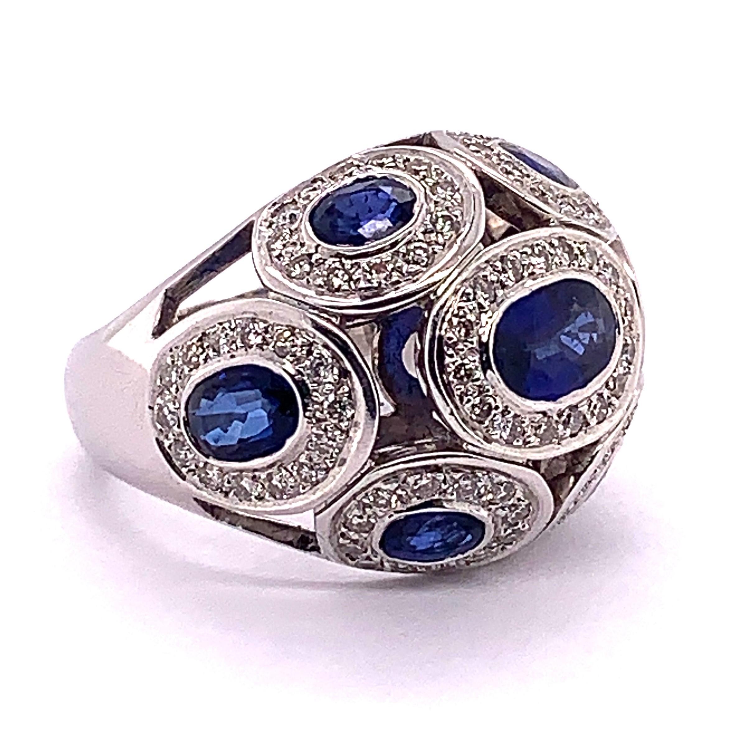 4.63 Carat Blue Oval Sapphire And Diamond Ring features 3.75 carats gorgeous royal blue color sapphires surrounded by round white diamonds. The white diamonds weigh 0.88 carats. This ring is set in 18 Karat White Gold, Weighing 15.45 Grams.

Color