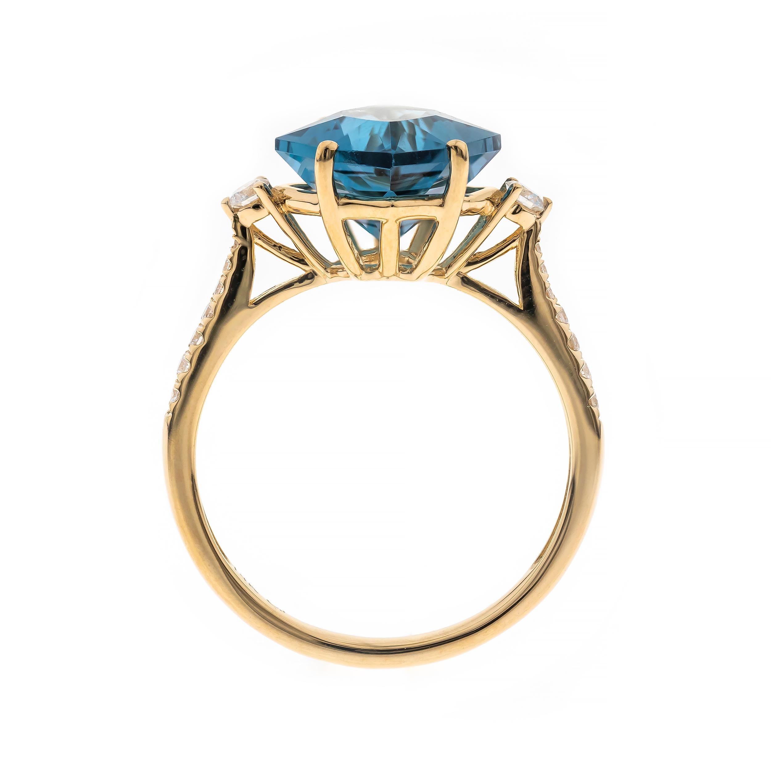 Decorate yourself in elegance with this Ring is crafted from 14-karat Yellow Gold by Gin & Grace. This Ring is made up of 10x13 mm Marquise-Cut (1 pcs) 4.63 carat London Blue Topaz and Round-cut White Diamond (16 Pcs) 0.15 Carat. This Ring is weight