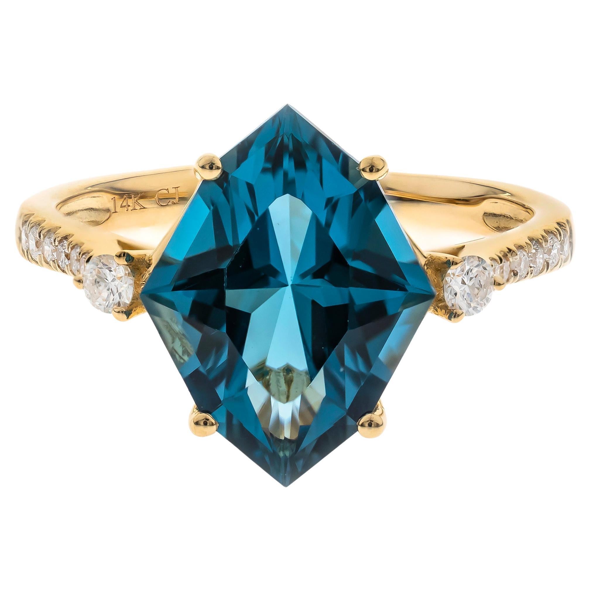 Bague en or jaune 14 carats avec diamants et topaze bleue de Londres taillée en marquise de 4,63 carats