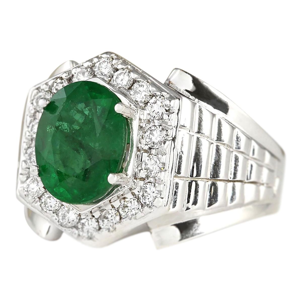 Presenting our sophisticated Men's Ring, featuring a captivating 4.63 Carat Natural Emerald set in 14 Karat White Gold. The emerald, measuring 11.00x9.00 mm, is complemented by 0.60 Carat of brilliant diamonds. With a total ring weight of 12.9 grams