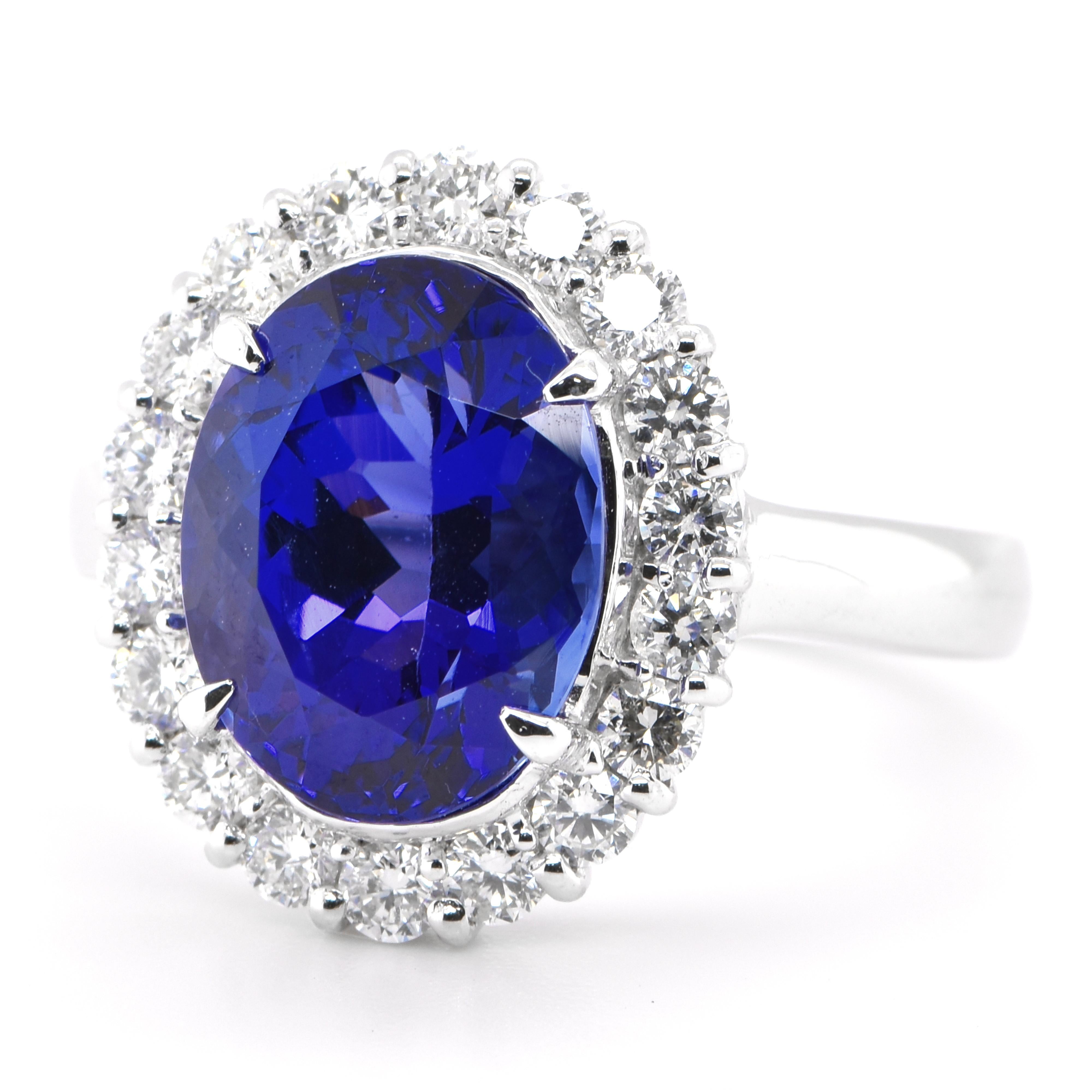 A beautiful Cocktail Ring featuring a 4.63 Carat Natural Tanzanite and 0.72 Carats of Diamond Accents set in Platinum. Tanzanite's name was given by Tiffany and Co after its only known source: Tanzania. Tanzanite displays beautiful pleochroic colors