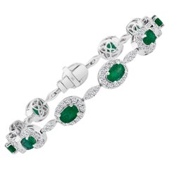Bracciale con smeraldo taglio ovale e diamanti naturali da 4,63 carati in oro bianco 18 carati ref460