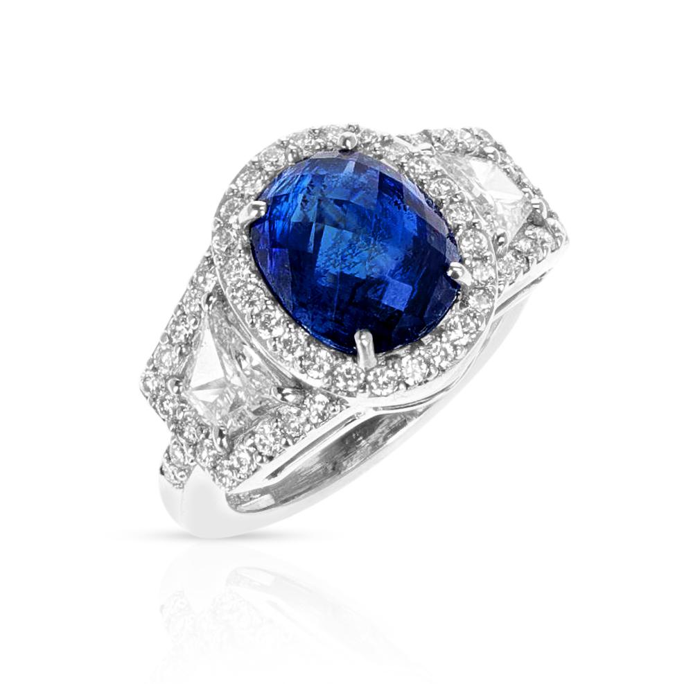 A 4.64 ct. Unheated Sapphire Ring with Diamonds made in Platinum. The ring size is US 6.25 and the total weight is 10 grams.
