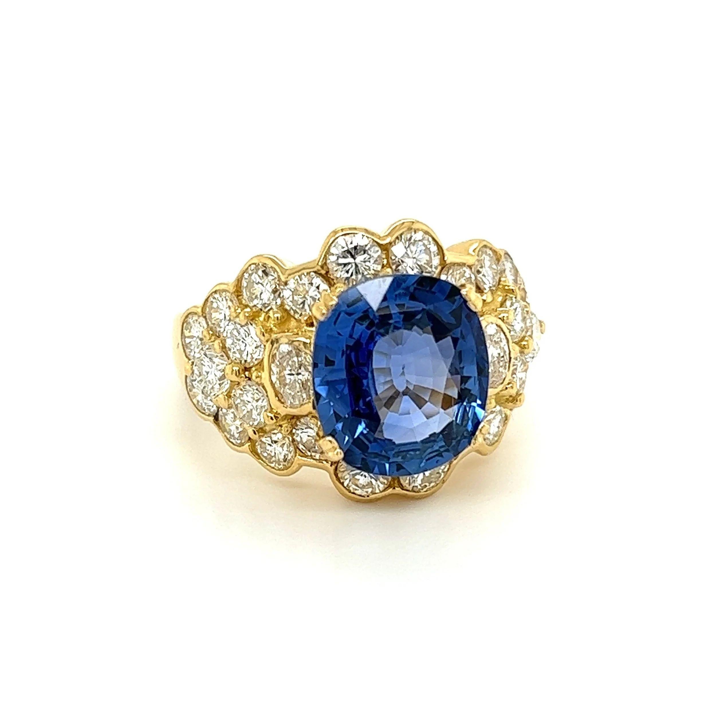 Simply Beautiful! Elegant and finely detailed Blue Sapphire and Diamond Dome Gold Vintage Cocktail Ring. Centering a securely nestled Hand set 4.64 Oval Blue Sapphire. Artfully surrounded by Diamonds, weighing approx. 3.22tcw. Ring size 7.75, ring