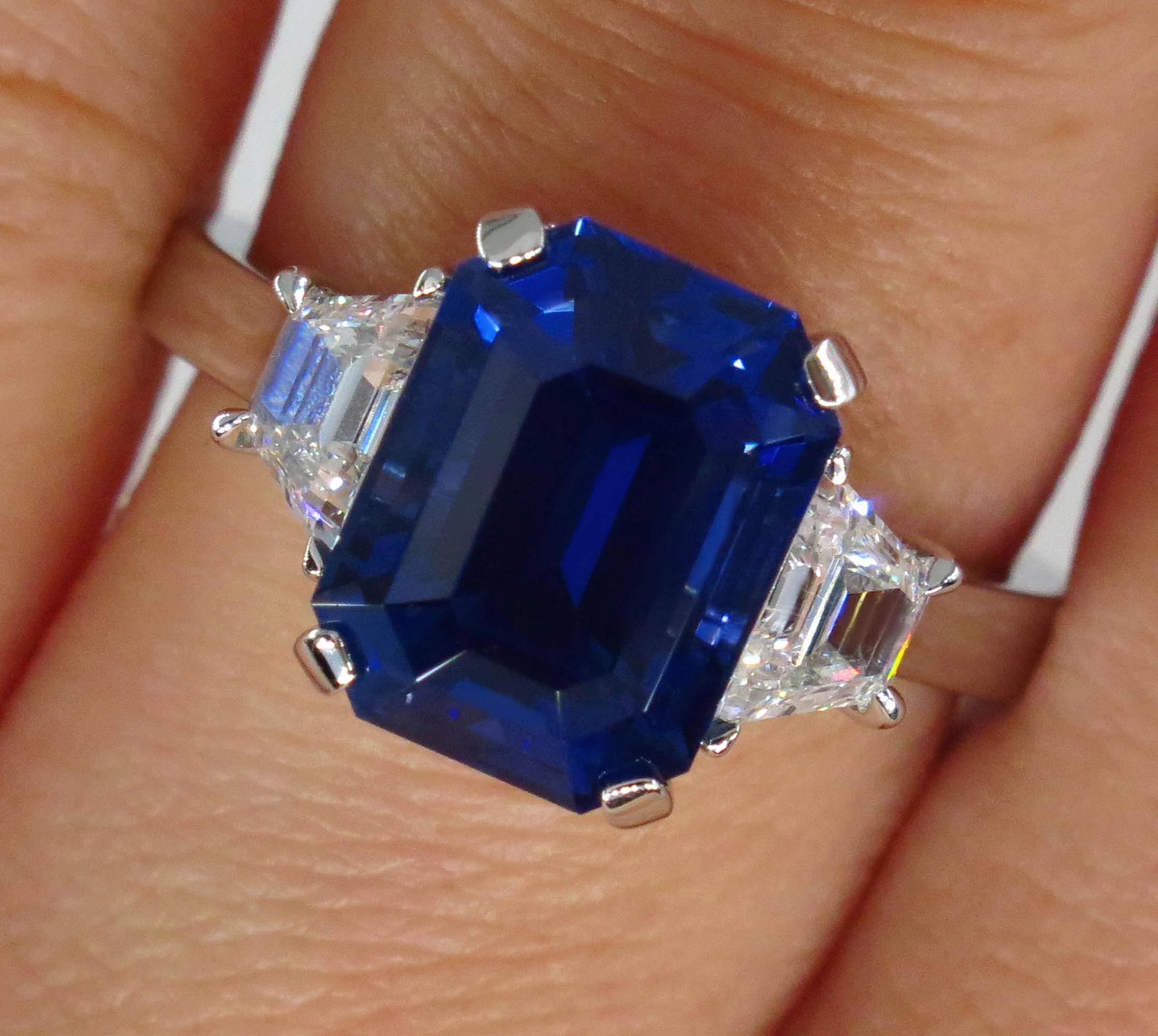 Iconic Style and VERY ELEGANT Ceylon Natural Gorgeous Deep Blue Sapphire & Diamond Trilogy Ring.

A SUPER fine Estate Ring features a Gorgeous gem : 4.16 carat Natural CEYLON Emerald Cut Deep Blue SAPPHIRE, measuring 9.97x7.51x5.88mm, bearing a
