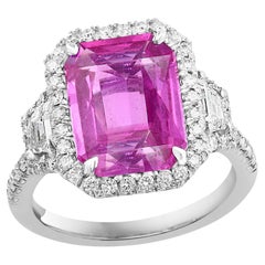 4.65 Carat Emerald Cut Pink Sapphire Diamond Three-Stone Halo Engagement Ring