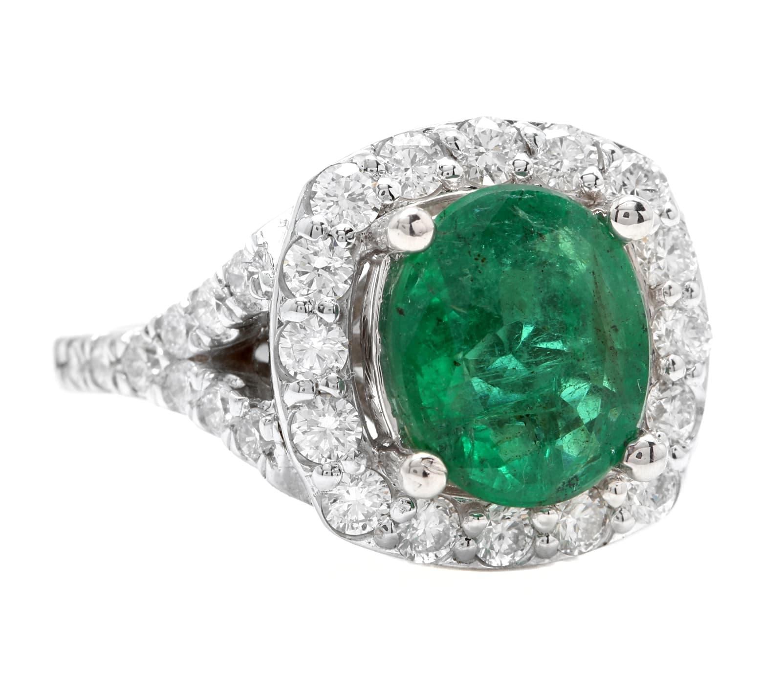 4.65 Carats Natural Emerald and Diamond 14K Solid White Gold Ring

Total Natural Green Emerald Weight is: Approx. 3.50 Carats (transparent)

Emerald Measures: Approx. 10.20 x 8.60mm

Emerald Treatment: Oiling

Natural Round Diamonds Weight: Approx. 