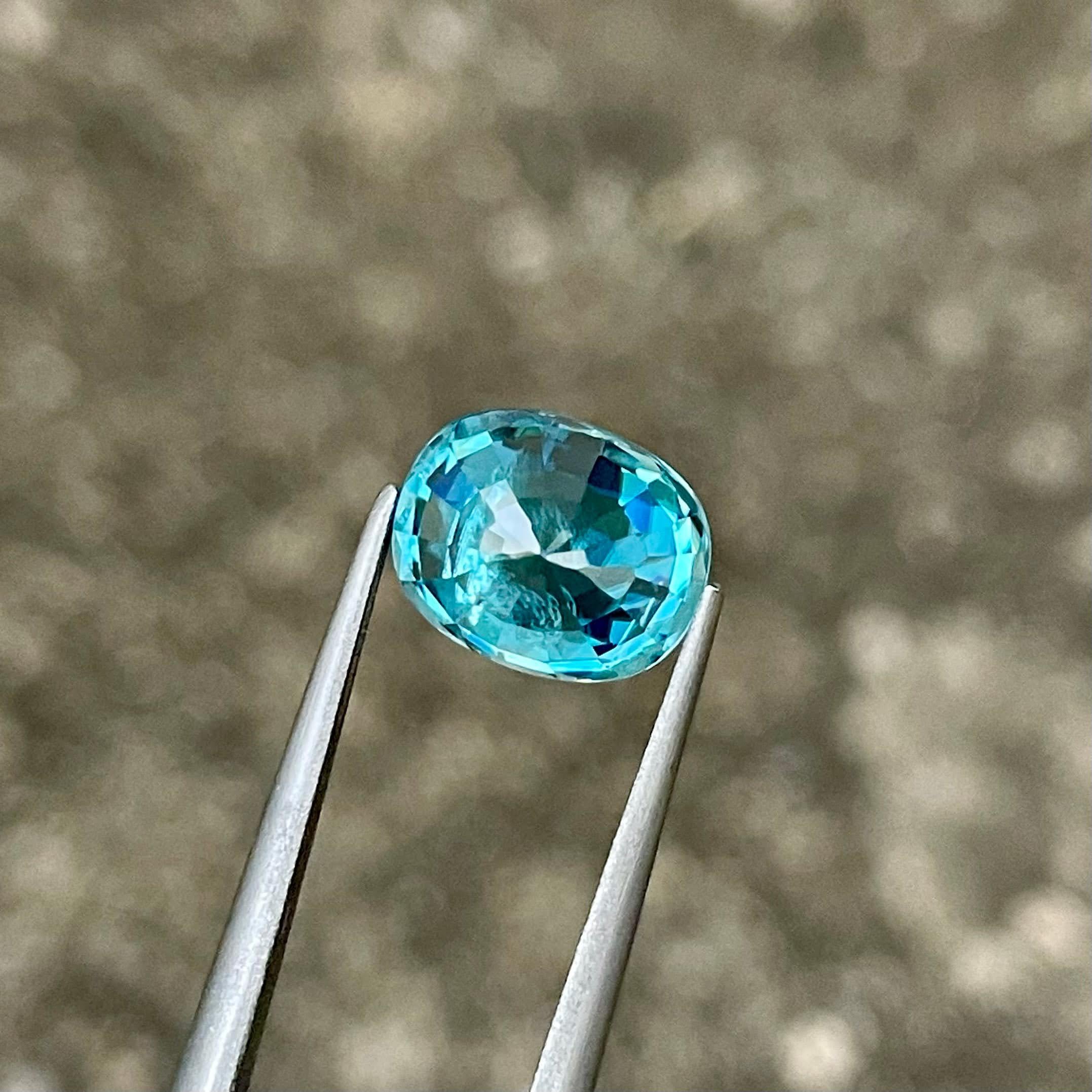 Weight 4.65 carats 
Dimensions 9.71x7.88x5.60 mm
Treatment Heated 
Origin Cambodia 
Clarity VS
Shape cushion 
Cut fancy cushion 


This exquisite 4.65 carat Blue Zircon gemstone is a stunning example of natural beauty, sourced from the rich lands of