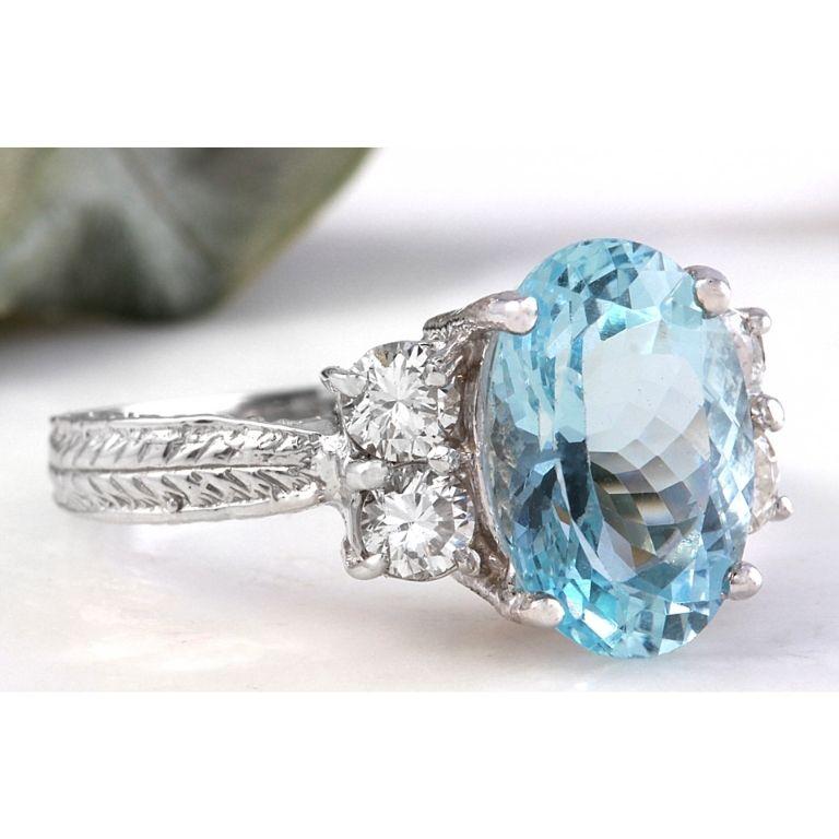 4.65 Carats Natural Aquamarine and Diamond 14K Solid White Gold Ring

Total Natural Oval Cut Aquamarine Weights: Approx. 4.00 Carats

Aquamarine Measures: Approx. 11.00 x 9mm

Natural Round Diamonds Weight: Approx. 0.65 Carats (color G-H / Clarity