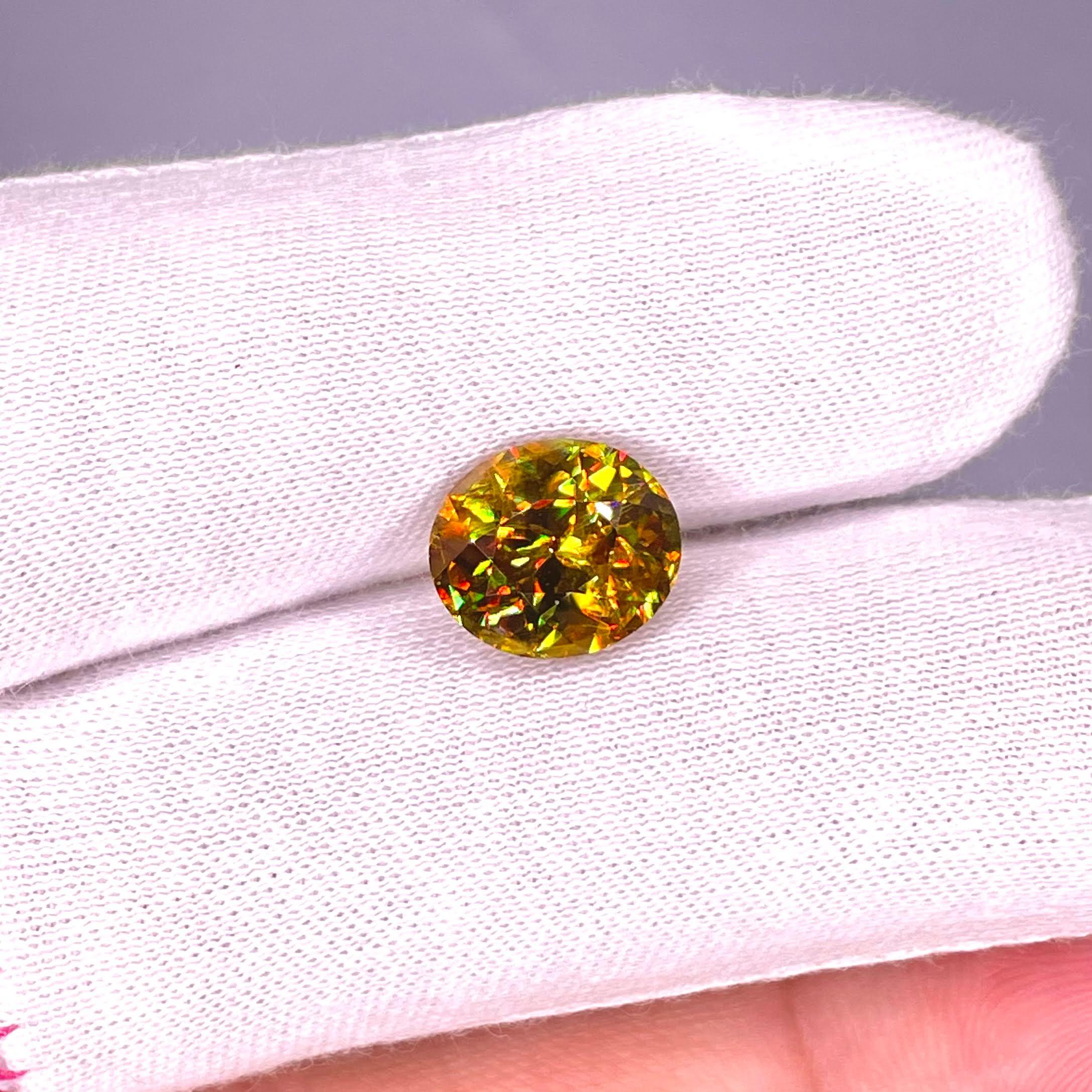Weight 4.65 carats 
Dimensions 11.35x9.82x6.53 mm 
Treatment none 
Origin Madagascar 
Clarity VVS
Shape oval 
Cut fancy oval 



The exquisite beauty of a 4.65 carat Sphene stone unfolds in this fine example of a gem from Madagascar. Exhibiting an