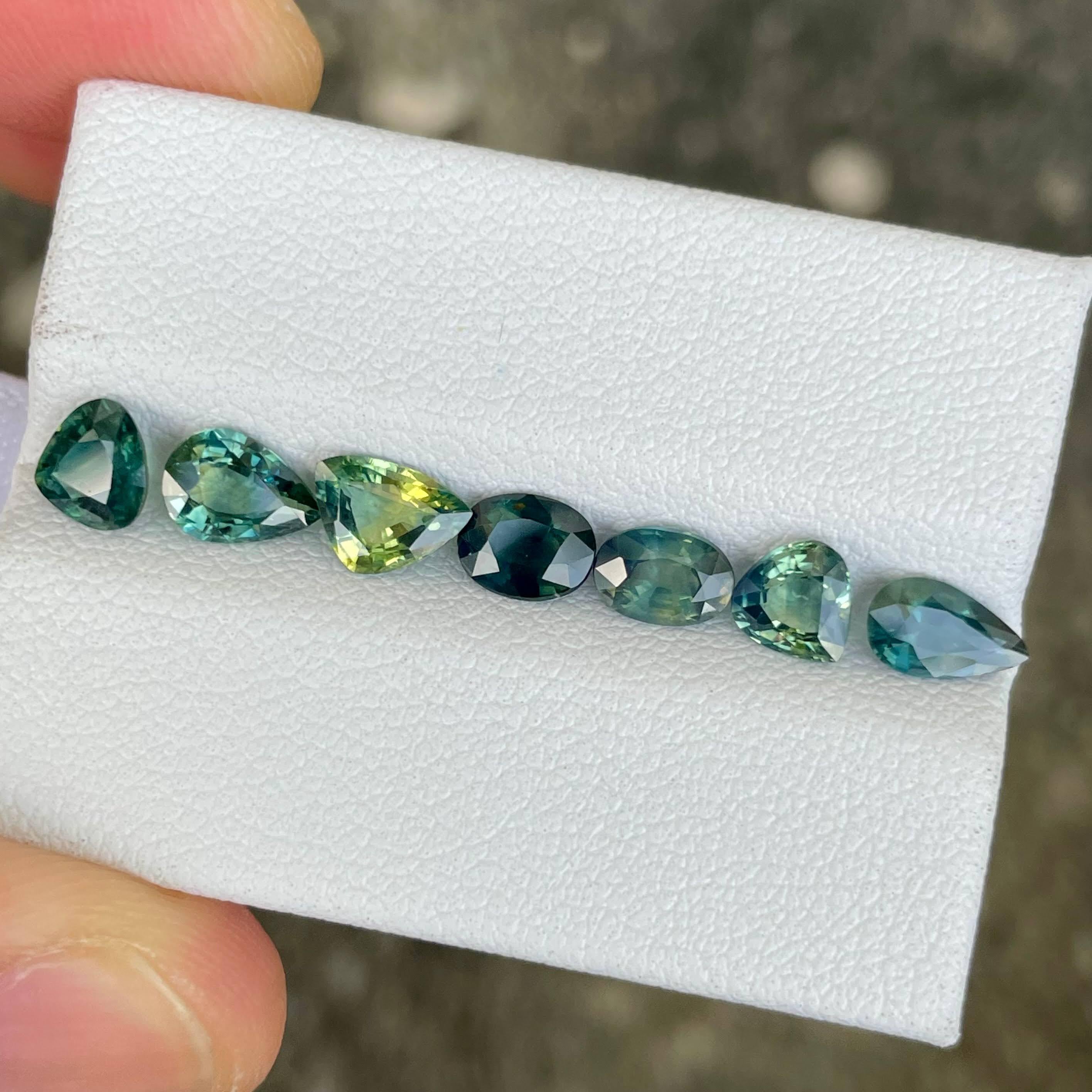 Mixed Cut 4.65 Carats Parti Sapphire Stones 7 Piece Gemstones Lot from Madagascar For Sale