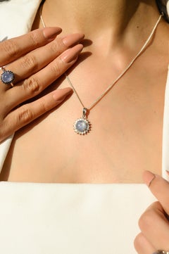 4.65ct Star Sapphire Cabochon & Diamond Sunburst Halo Pendant in 14K White Gold