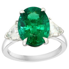 4.66 Carat Oval Cut Emerald and Diamond Engagement Ring in Platinum