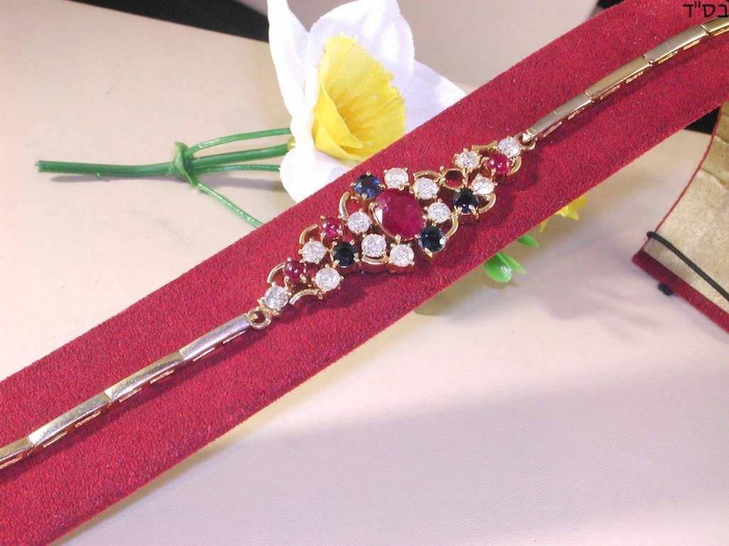 Contemporary 4.66 Carat Yellow Gold Diamond Ruby Sapphire Bracelet For Sale