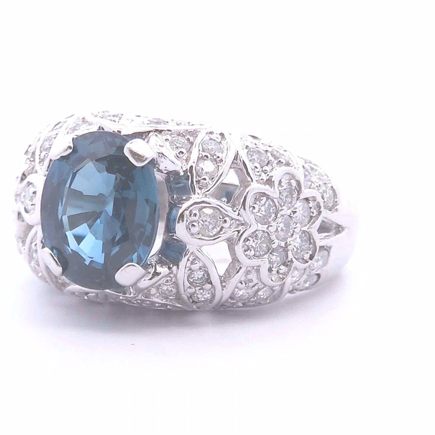 Luxury, at the right price

This unique blue sapphire ring has a 4.66 carat total weight. The center stone is a blue sapphire oval cut stone weighing 3.38 carats. Surrounding the blue sapphire are 1.88 carats of round cut diamonds 14K white
