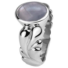 4.66 Carat Lilac-Grey Star Sapphire Ring with an 18 Karat White Gold Carved Band