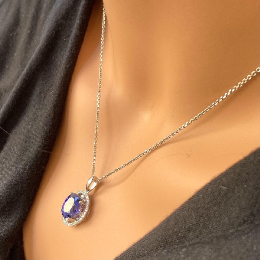 4.67 Carat Blue Oval Tanzanite & Diamond Pendant In 14k White Gold In New Condition For Sale In Chicago, IL