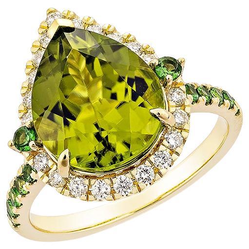 4.67 Carat Peridot with Tsavorite and White Diamond Ring in 18 Karat Yellow Gold