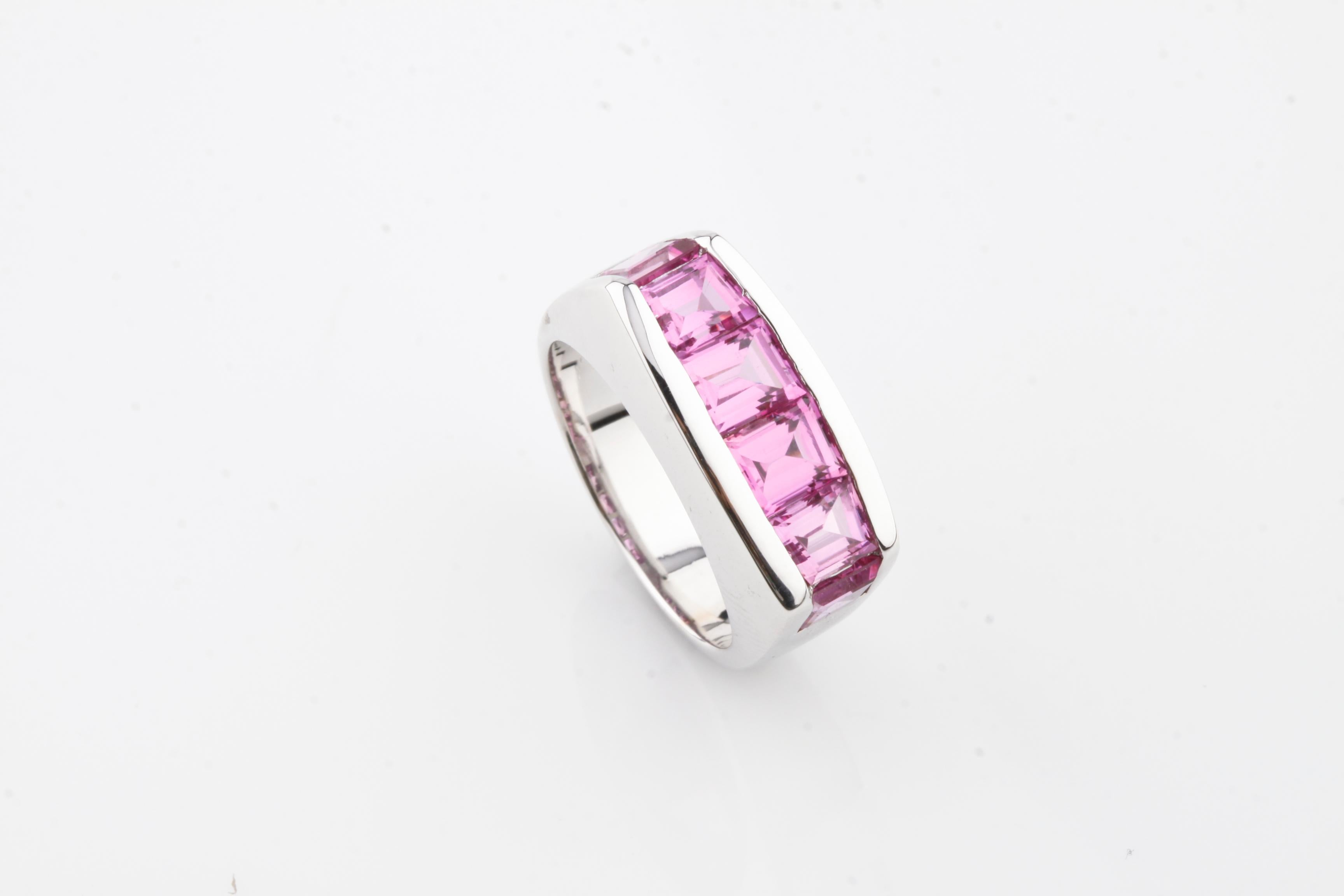 One electronically tested 14k white gold ladies laboratory created pink sapphire ring with a bright finish. Condition is good, Identified with the markings of 