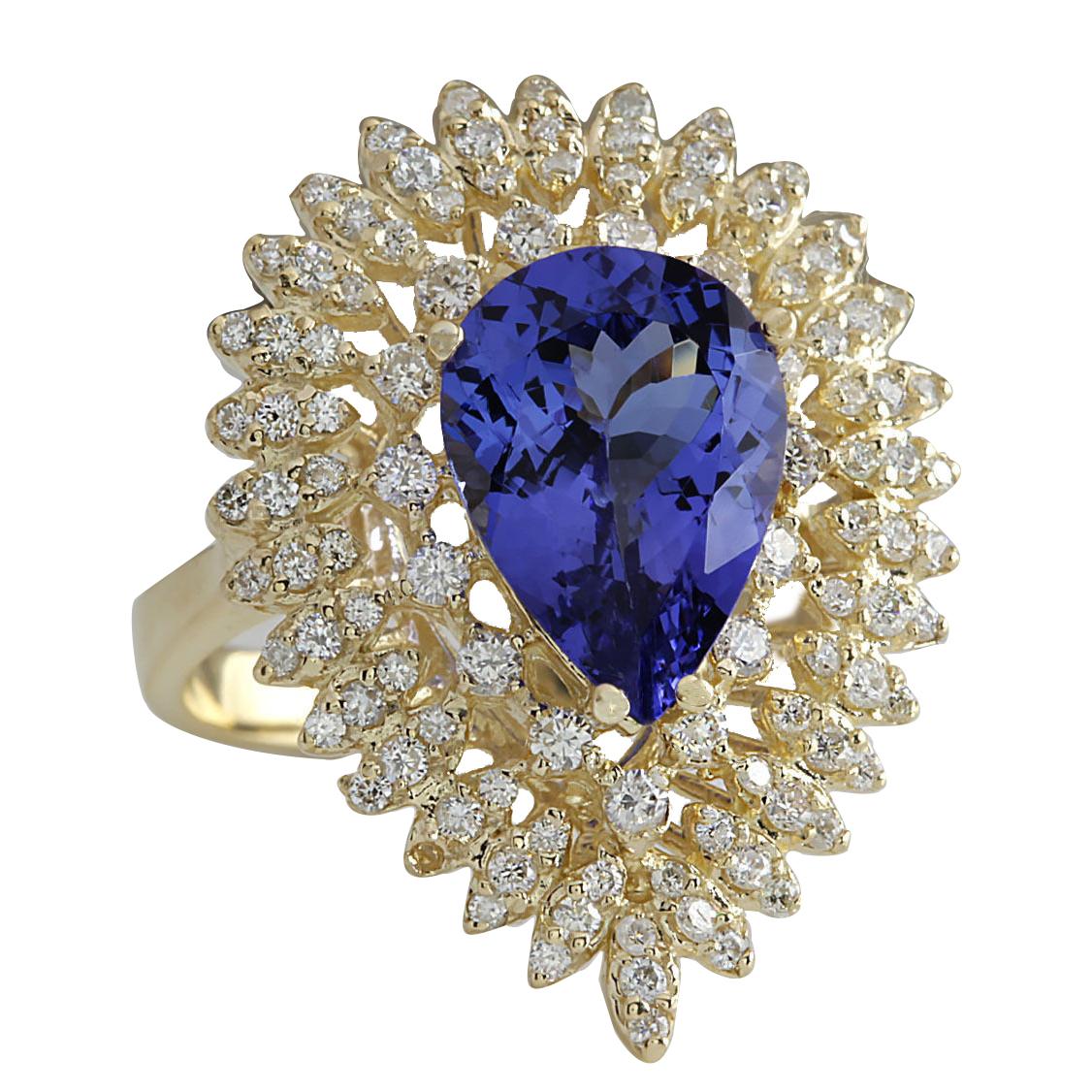 4.68 Carat Natural Tanzanite 14 Karat Yellow Gold Diamond Ring
Stamped: 14K Yellow Gold
Total Ring Weight: 7.2 Grams
Total Natural Tanzanite Weight is 3.68 Carat (Measures: 10.00x8.00 mm)
Color: Blue
Total Natural Diamond Weight is 1.00 Carat
Color: