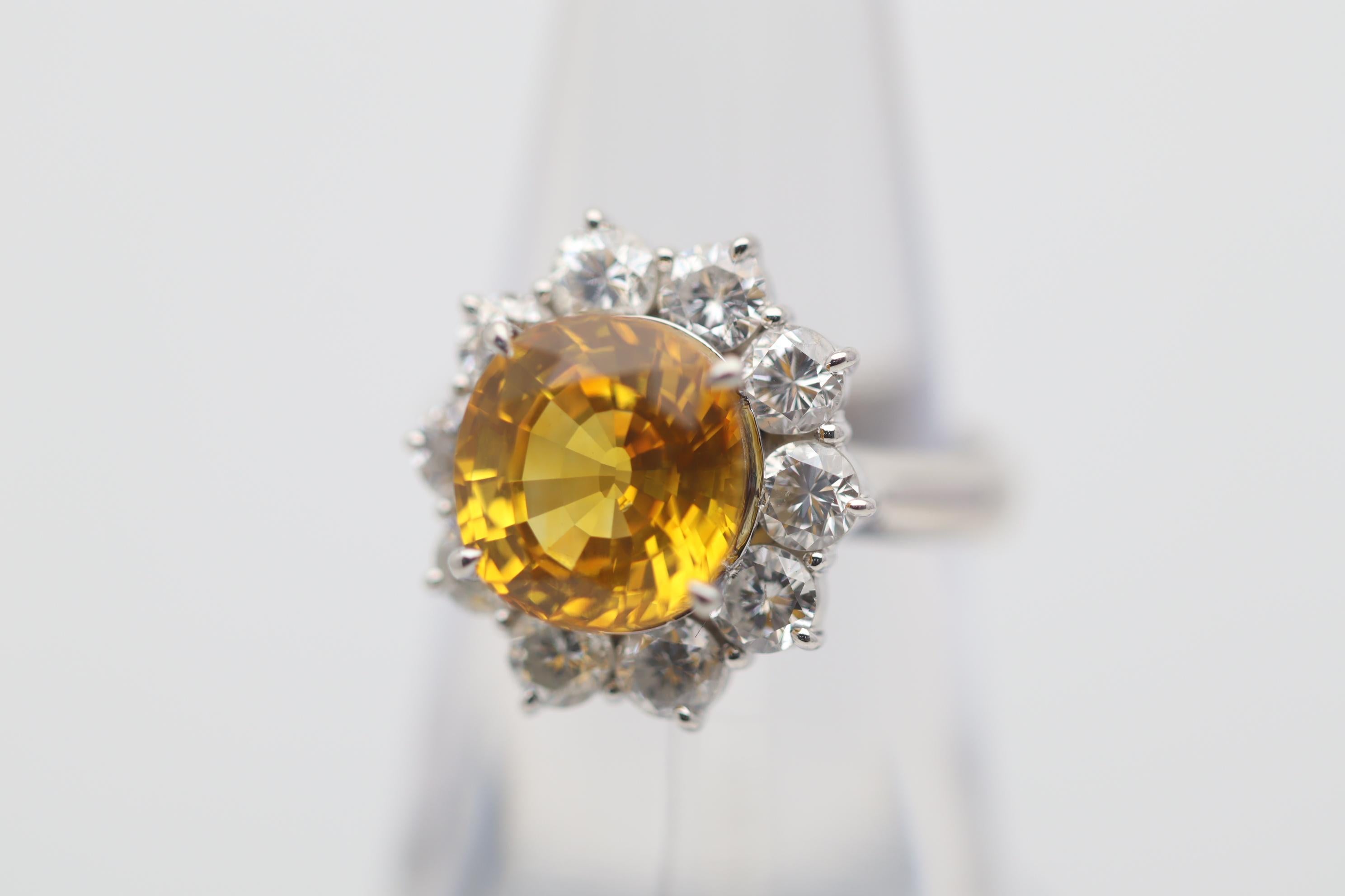 Oval Cut 4.68 Carat Orange Sapphire Diamond Halo Platinum Ring For Sale