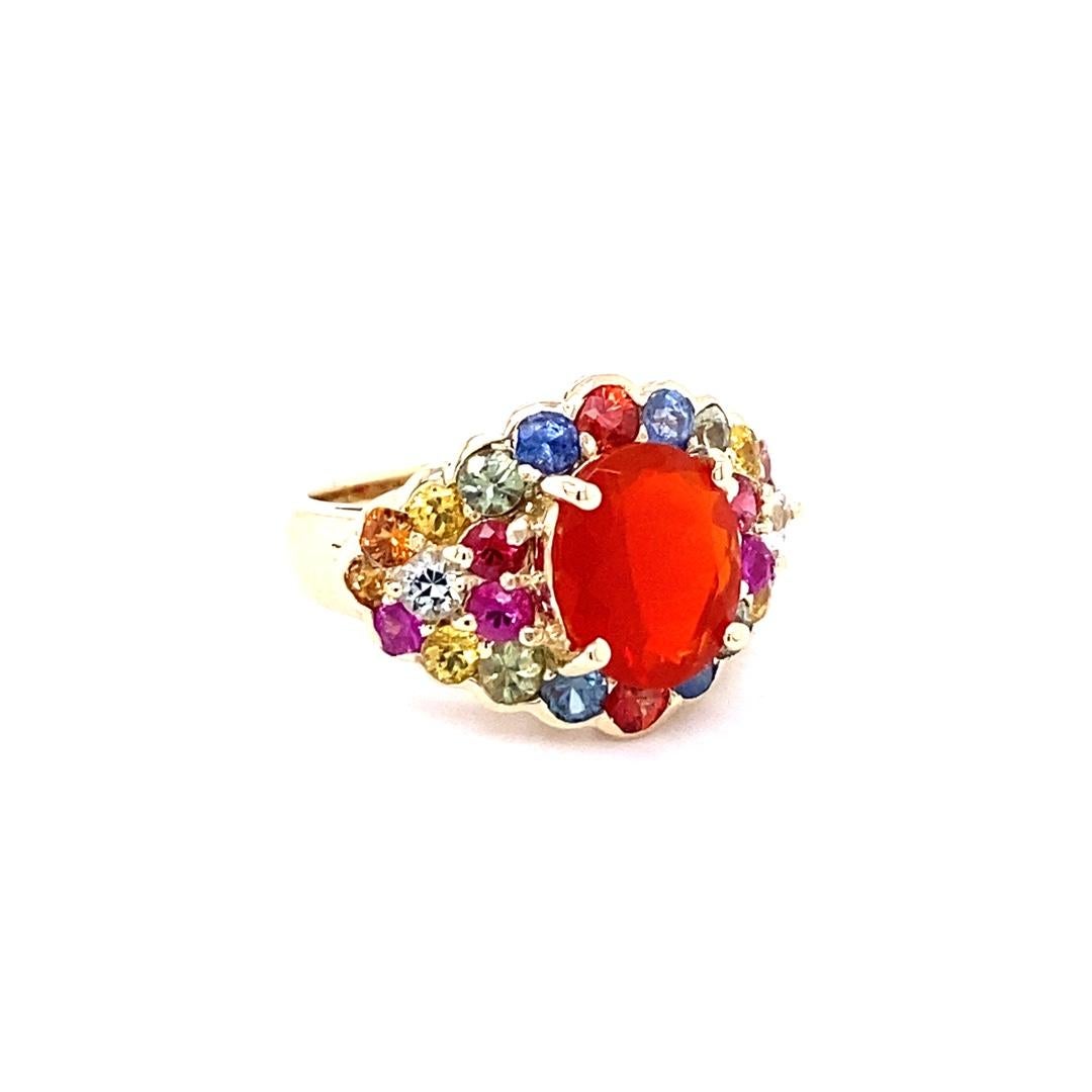 Contemporary 4.68 Carat Oval Cut Fire Opal Sapphire 14 Karat Yellow Gold Cocktail Ring For Sale