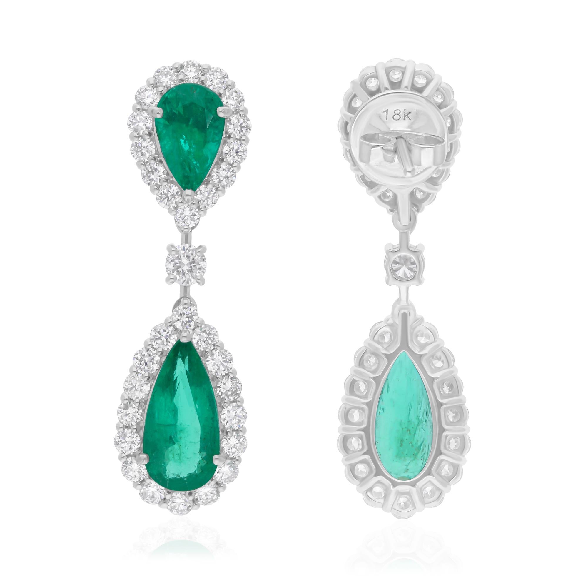 Cast from 14-karat gold, these exquisite earrings are handset with 4.68 carats Zambian emerald and 1.96 carats of sparkling diamonds.

FOLLOW SPECTRUM JEWELS storefront to view the latest collection & exclusive pieces. Spectrum Jewels is proudly