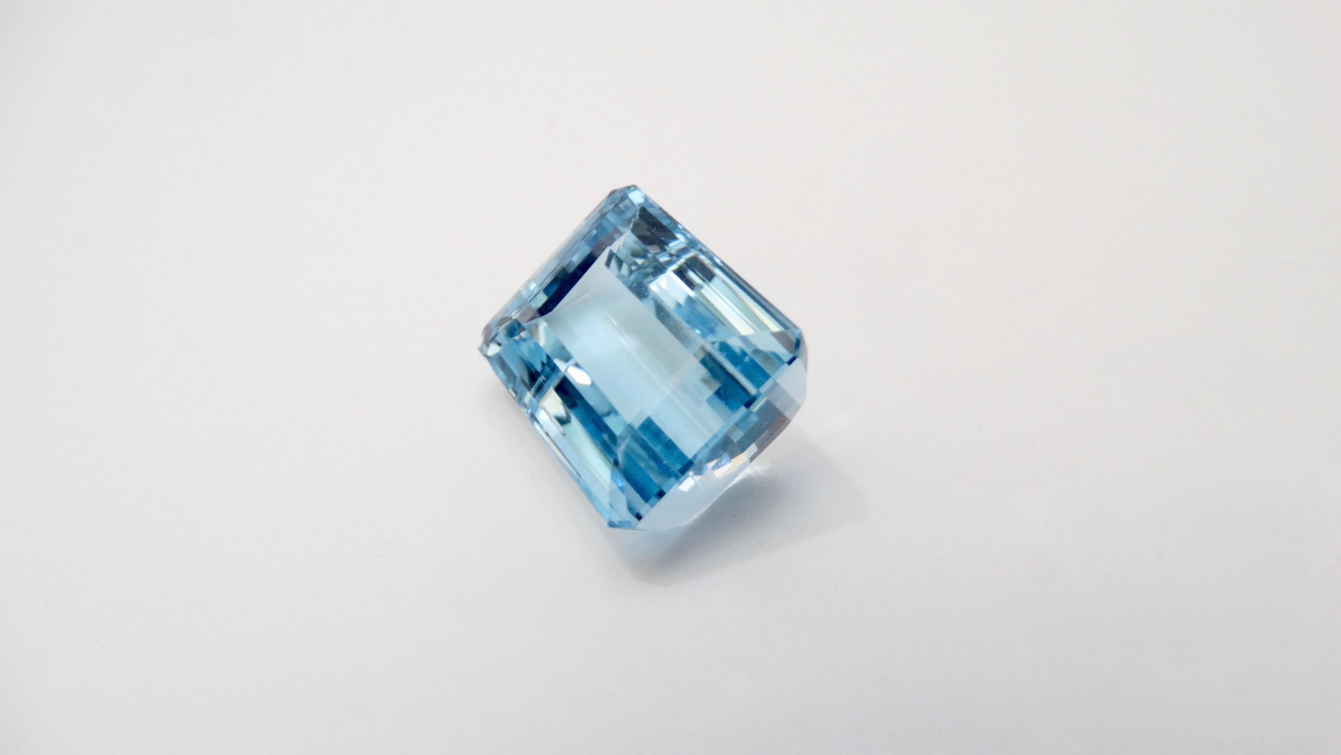 Create the jewelry piece of your dreams with this gorgeous 46.9 Carat blue Topaz octagon step cut gemstone. Weight in grams is 9.37. Measures 22 x 17.5 x 13.9 mm. 