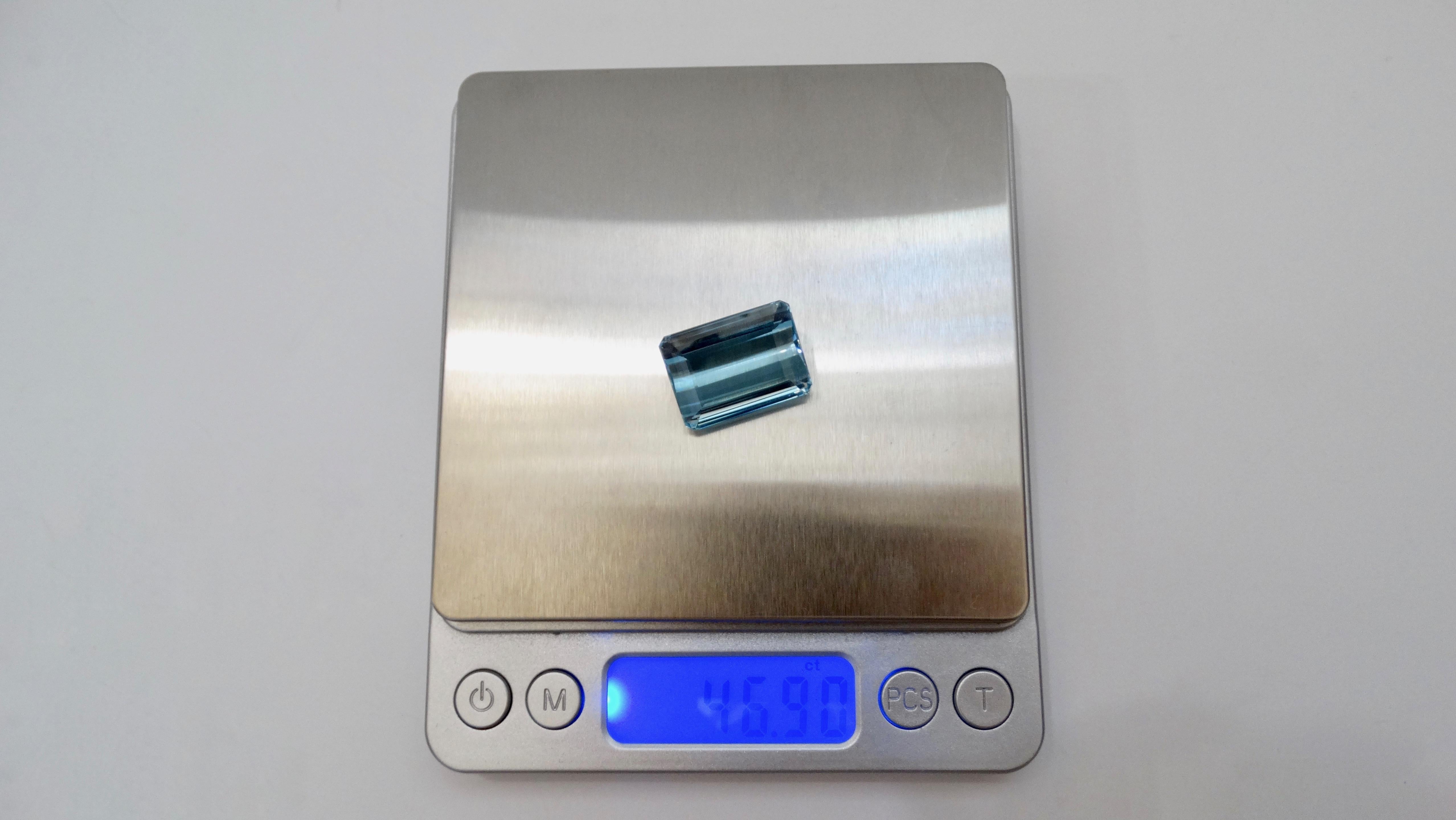 Emerald Cut Blue Topaz 46.9 Carat  Octagon Step Cut Gemstone For Sale