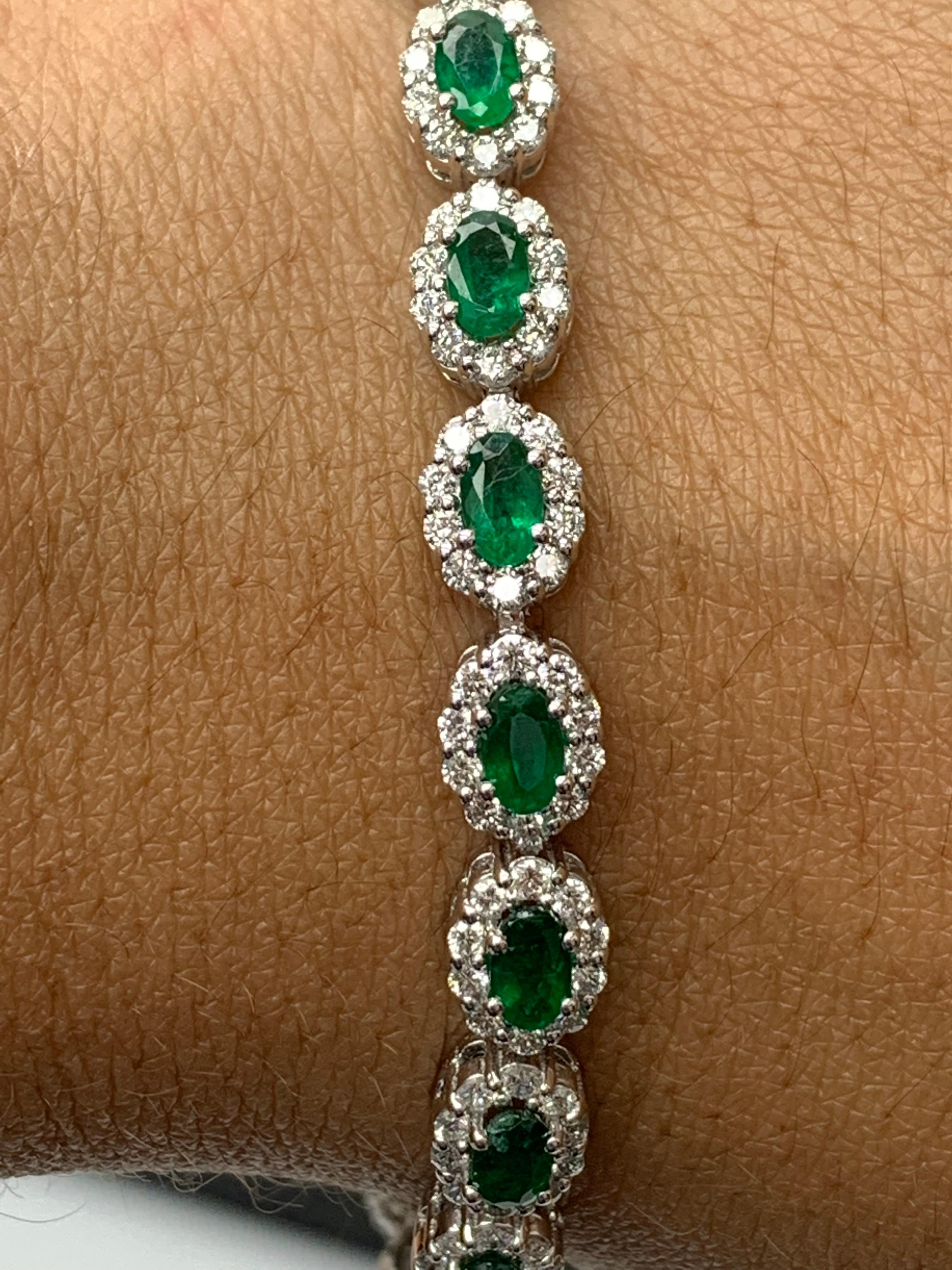 4.69 Carat Oval Cut Emerald and Diamond Halo Bracelet in 14K White Gold In New Condition For Sale In NEW YORK, NY