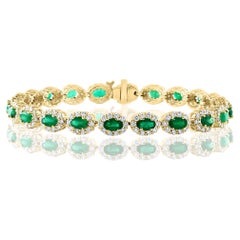 Bracelet en or jaune 14 carats avec émeraudes de taille ovale de 4,69 carats et halo de diamants