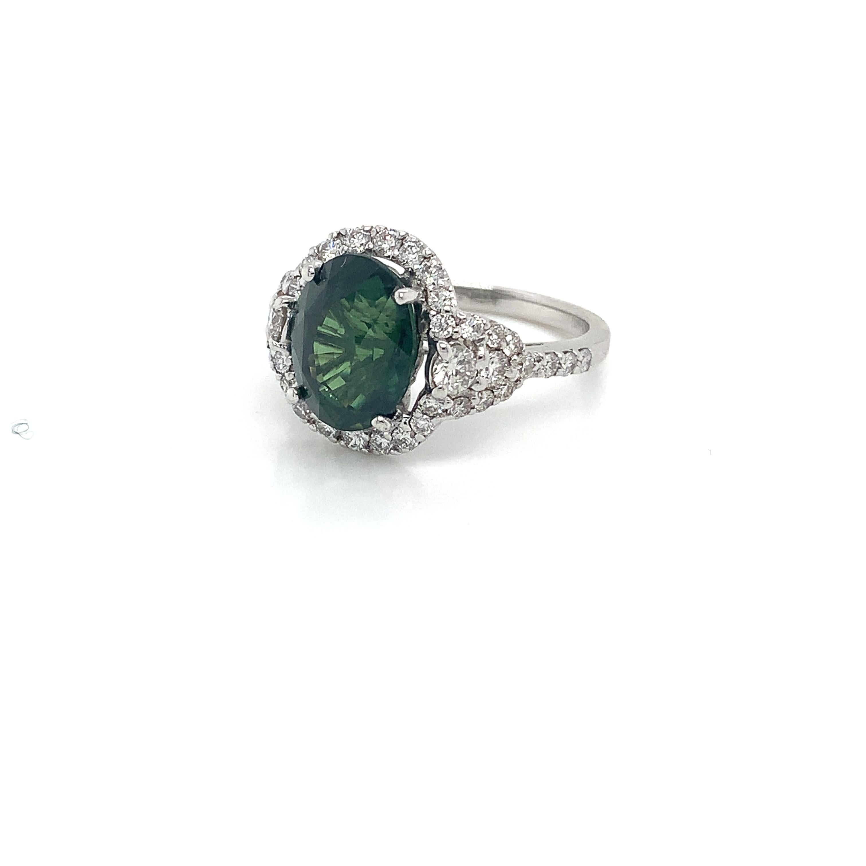 Modern 4.69 Carat Oval Green Sapphire & Diamond Ring in 18 Karat White Gold For Sale