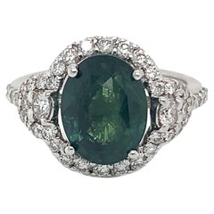 Bague en or blanc 18 carats avec saphir vert ovale de 4,69 carats et diamants