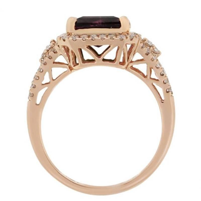 Style: Rose gold tourmaline diamond ring
Material: 14k rose gold
Gemstone Details: Approximately 4.69ct watermelon tourmaline gemstone
Diamond Details: Approximately 0.62ctw round brilliant diamonds. Diamonds are G/H in color and SI in clarity.
Ring