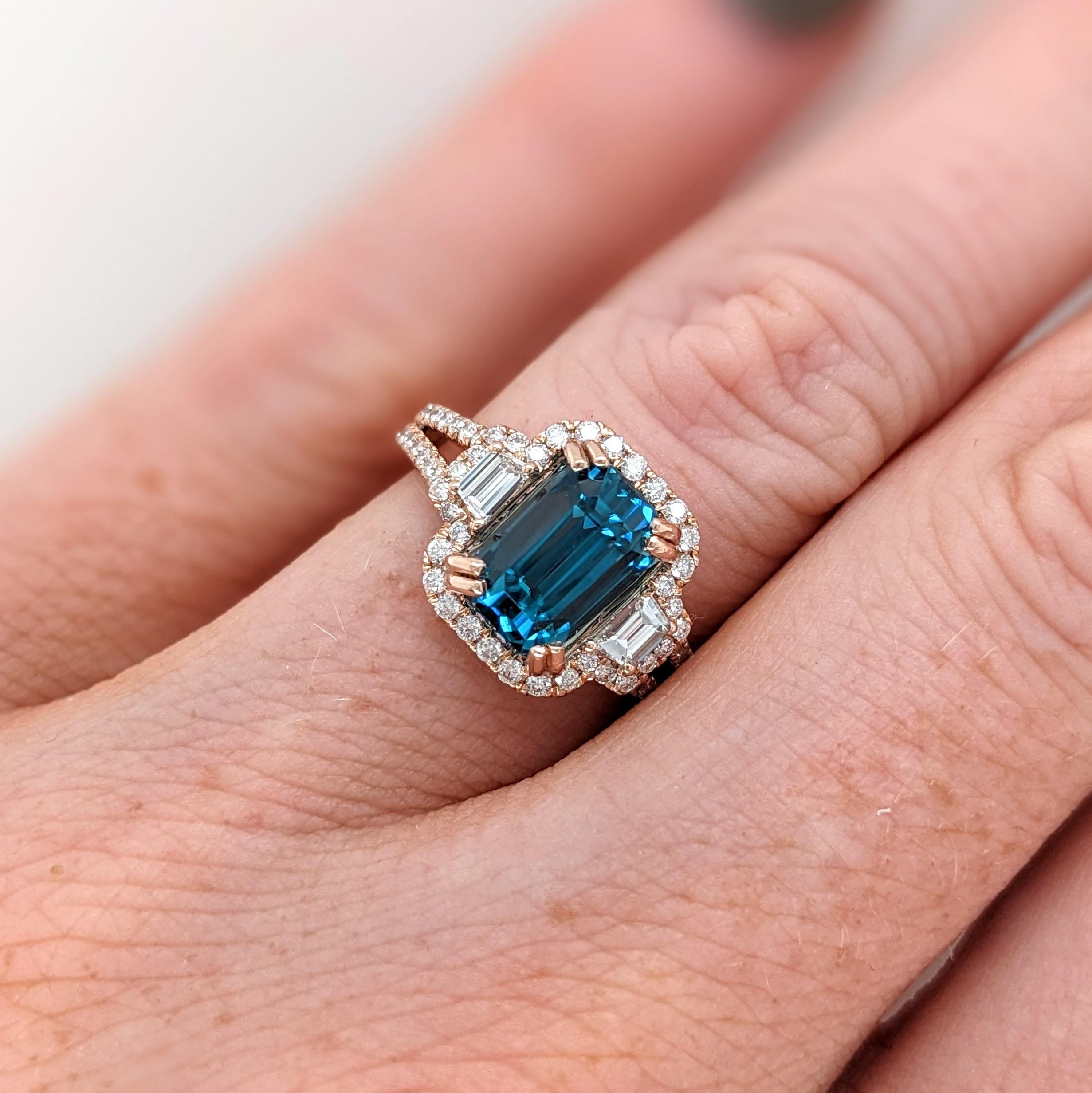 This beautiful ring features a stunning 4.62 carat Blue Zircon gemstone with natural earth mined diamonds set in solid 14K dual tone gold - white + rose gold. This ring makes a lovely December birthstone gift for your loved ones!