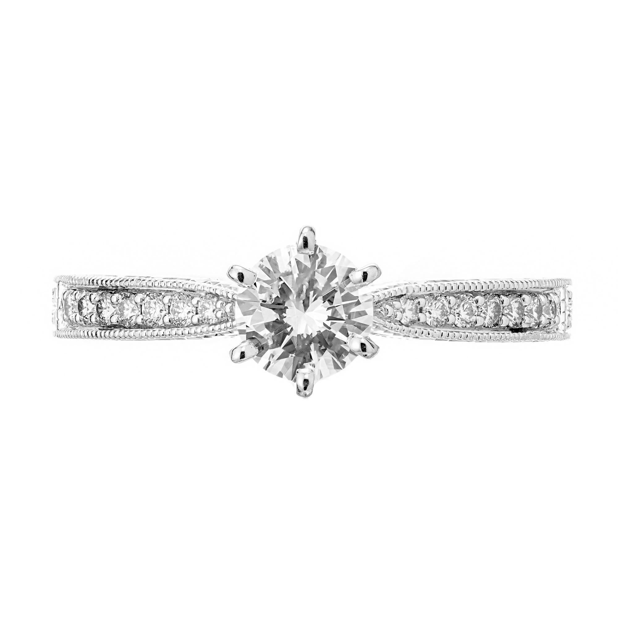 Simple classic six prong Diamond engagement ring with bead set diamond sides and hand engraving. EGL certified round brilliant cut center stone. 

1 round brilliant cut diamond, approx. total weight .46cts, E to F, SI1, Depth: 59.1% Table: 63%. EGL