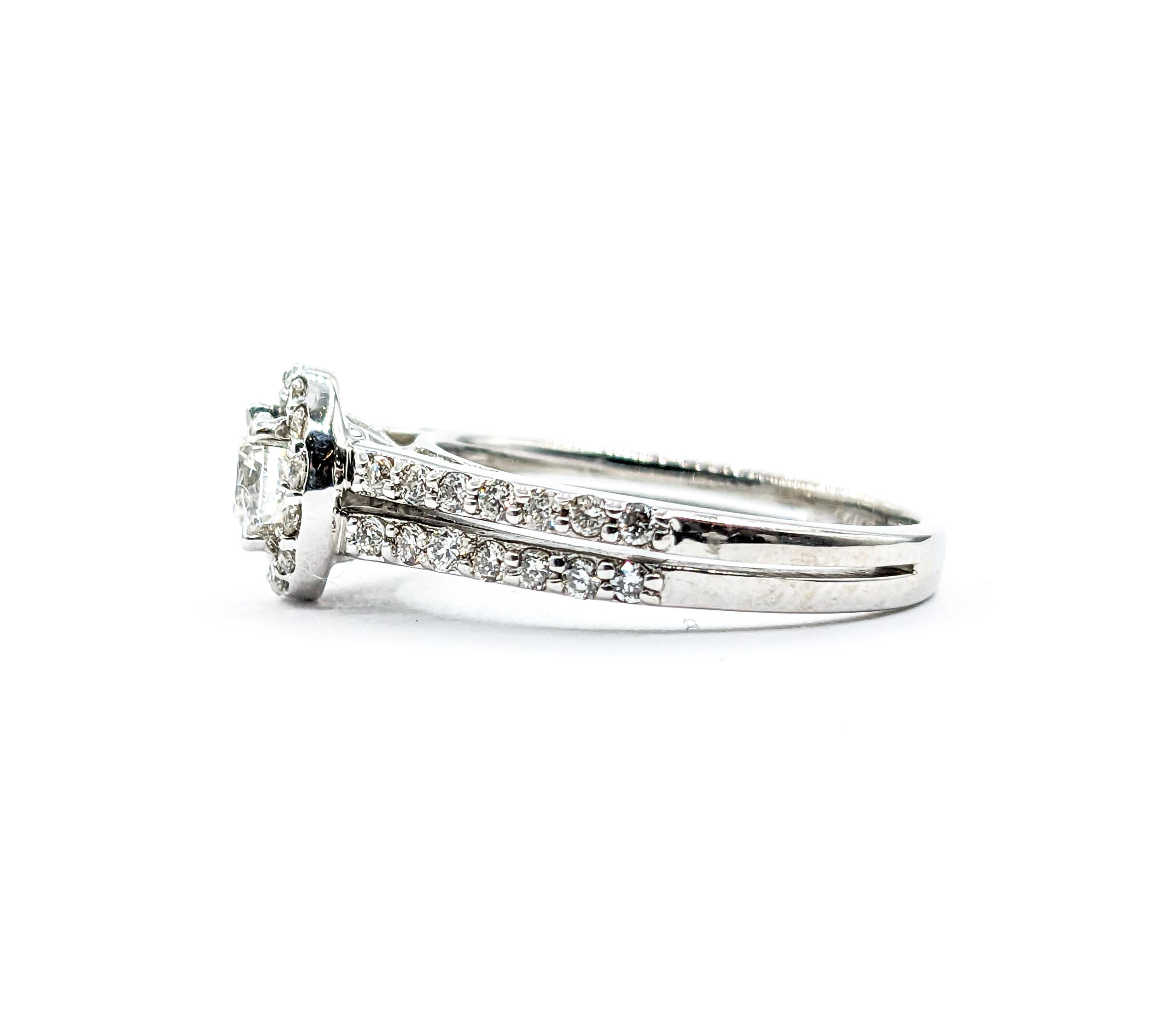 .46ctw Diamond Ring In White Gold

Explore the allure of this stunning ring, delicately crafted in 14 karat white gold. It showcases a .25 carat round diamond, sparkling with I clarity and a near-colorless white hue, ensuring a captivating