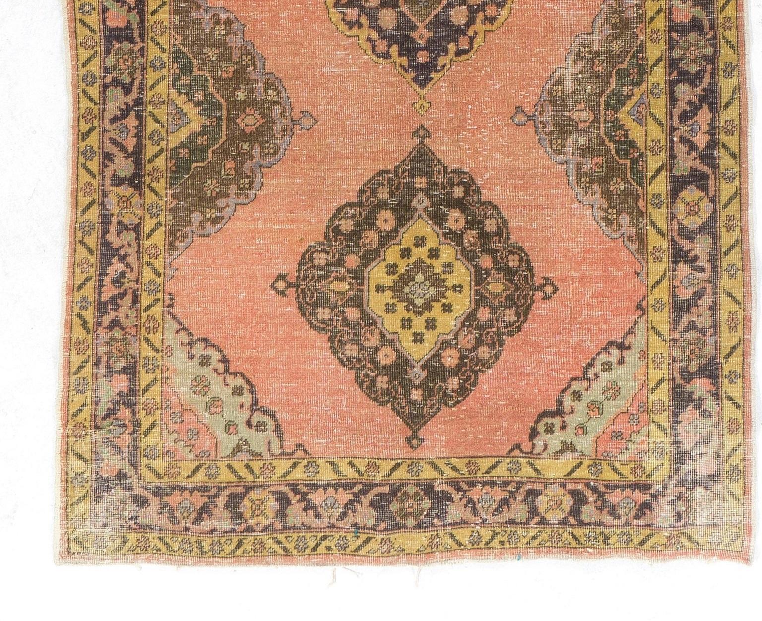 A vintage runner rug from Central Turkey. Finely hand-knotted with even medium wool pile on cotton foundation. Very good condition. Sturdy and as clean as a brand new rug (deep washed professionally). Measures: 4.6 x 12 ft.